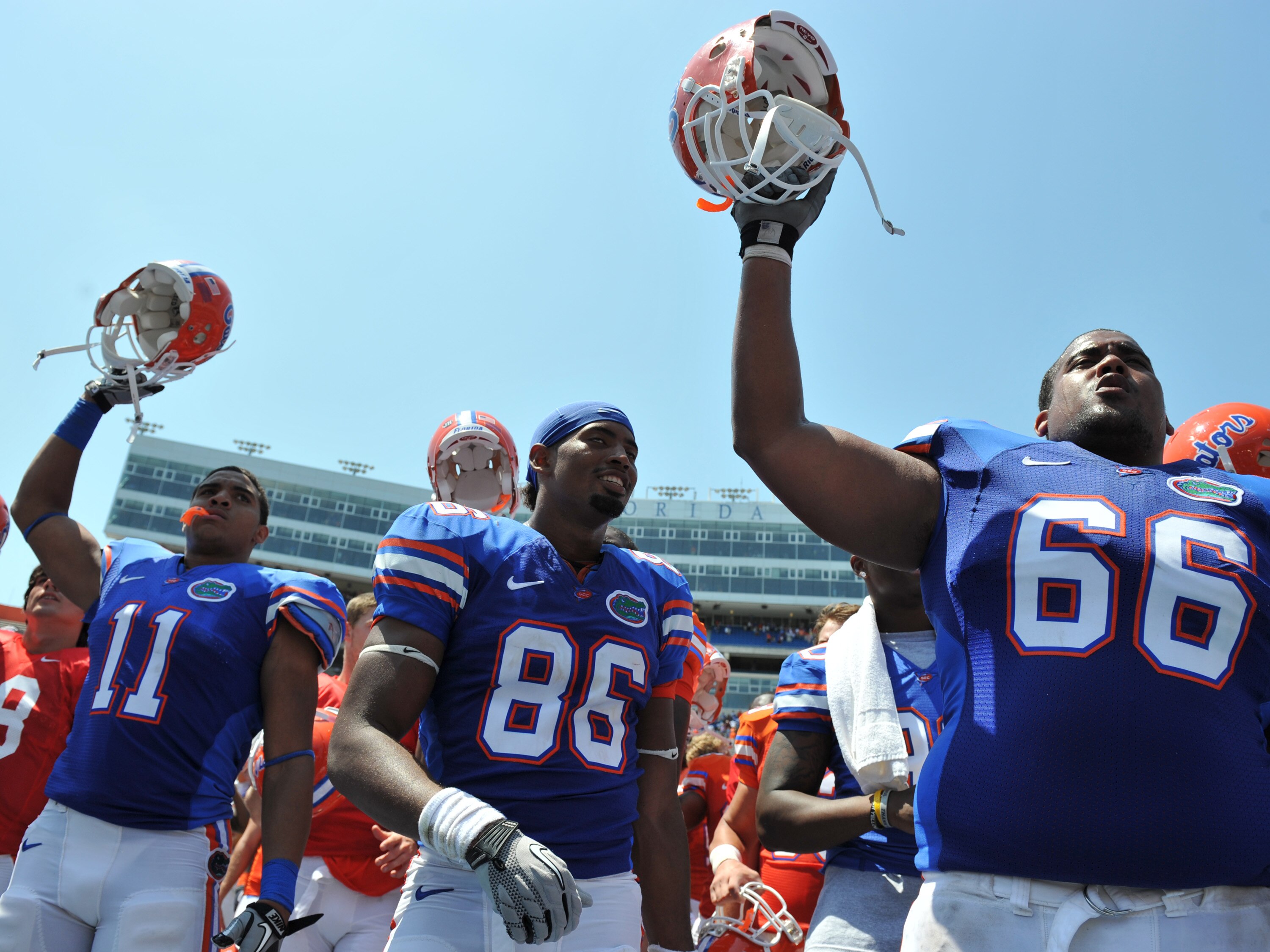 GAINESVILLE, FL - APRIL 9:  Tight end Jordan Reed #11, tight end Josh Postell #86 and guard James Wilson #66 of the Florida Gators celebrate after the Orange and Blue spring football game April 9, 2011 Ben Hill Griffin Stadium at Gainesville, Florida.  (P