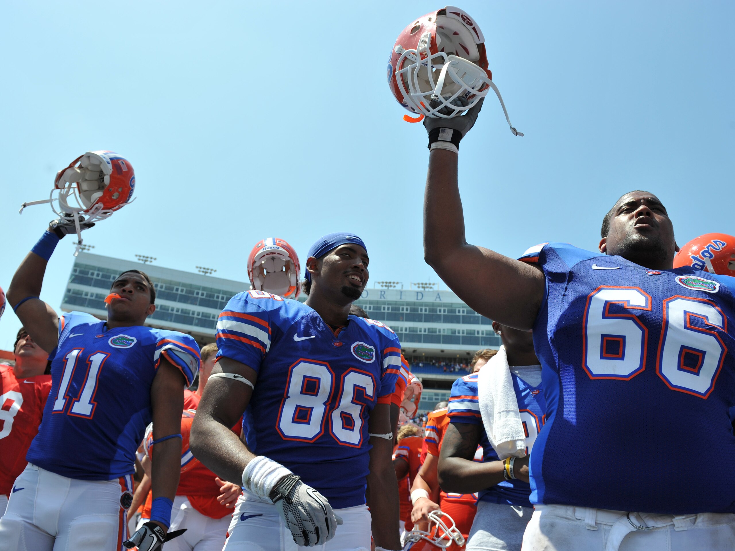 GAINESVILLE, FL - APRIL 9:  Tight end Jordan Reed #11, tight end Josh Postell #86 and guard James Wilson #66 of the Florida Gators celebrate after the Orange and Blue spring football game April 9, 2011 Ben Hill Griffin Stadium at Gainesville, Florida.  (P