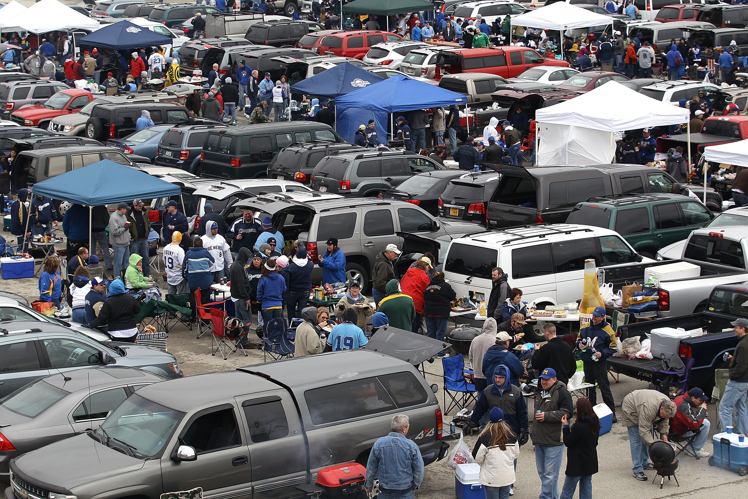 MILWAUKEE, WI - APRIL 04: Fans tailgate in the parking lot before the home opener between the Atlanta Braves and the Milwaukee Brewers at Miller Park on April 4, 2011 in Milwaukee, Wisconsin.  (Photo by Jonathan Daniel/Getty Images)