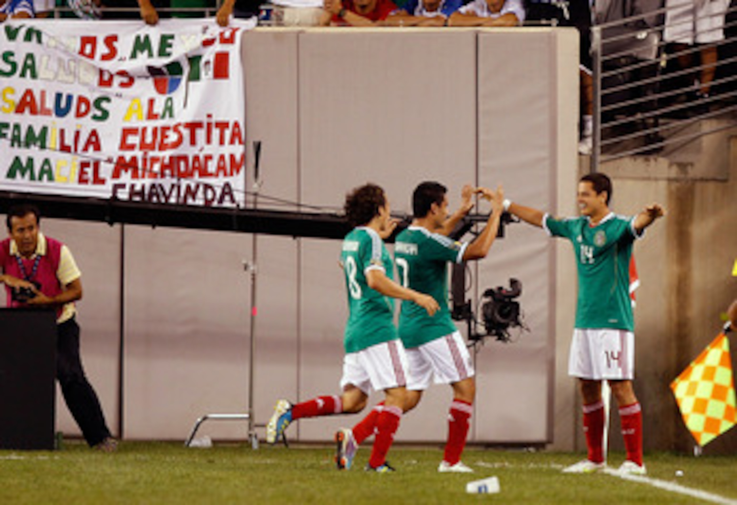 EAST RUTHERFORD, NJ - JUNE 18: Javier Hernandez #14 of Mexico celebrates the game winning goal in the second half against Guatemala during the 2011 Gold Cup Quarterfinals on June 18, 2011 at the New Meadowlands Stadium in East Rutherford, New Jersey (Ph EAST RUTHERFORD, NJ - JUNE 18: Javier Hernandez #14 of Mexico celebrates the game winning goal in the second half against Guatemala during the 2011 Gold Cup Quarterfinals on June 18, 2011 at the New Meadowlands Stadium in East Rutherford, New Jersey (Ph