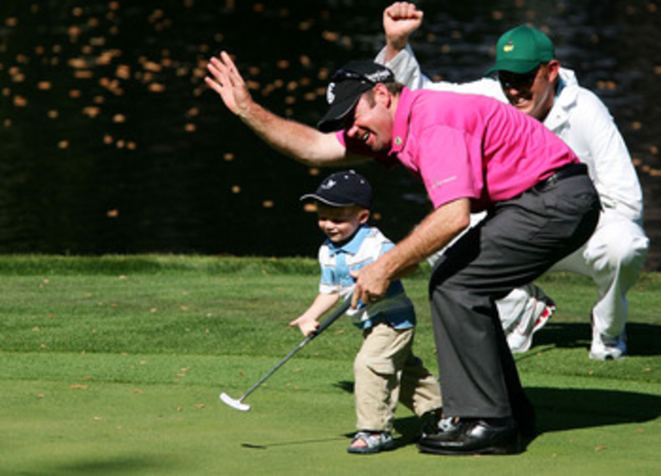 AUGUSTA, GA - APRIL 04:  Rod Papmling of Australia celebrates with his son Samuel on the ninth green during the Par-3 contest prior to the start of The Masters at the Augusta National Golf Club on April 4, 2007 in Augusta, Georgia.  (Photo by Harry How/Ge
