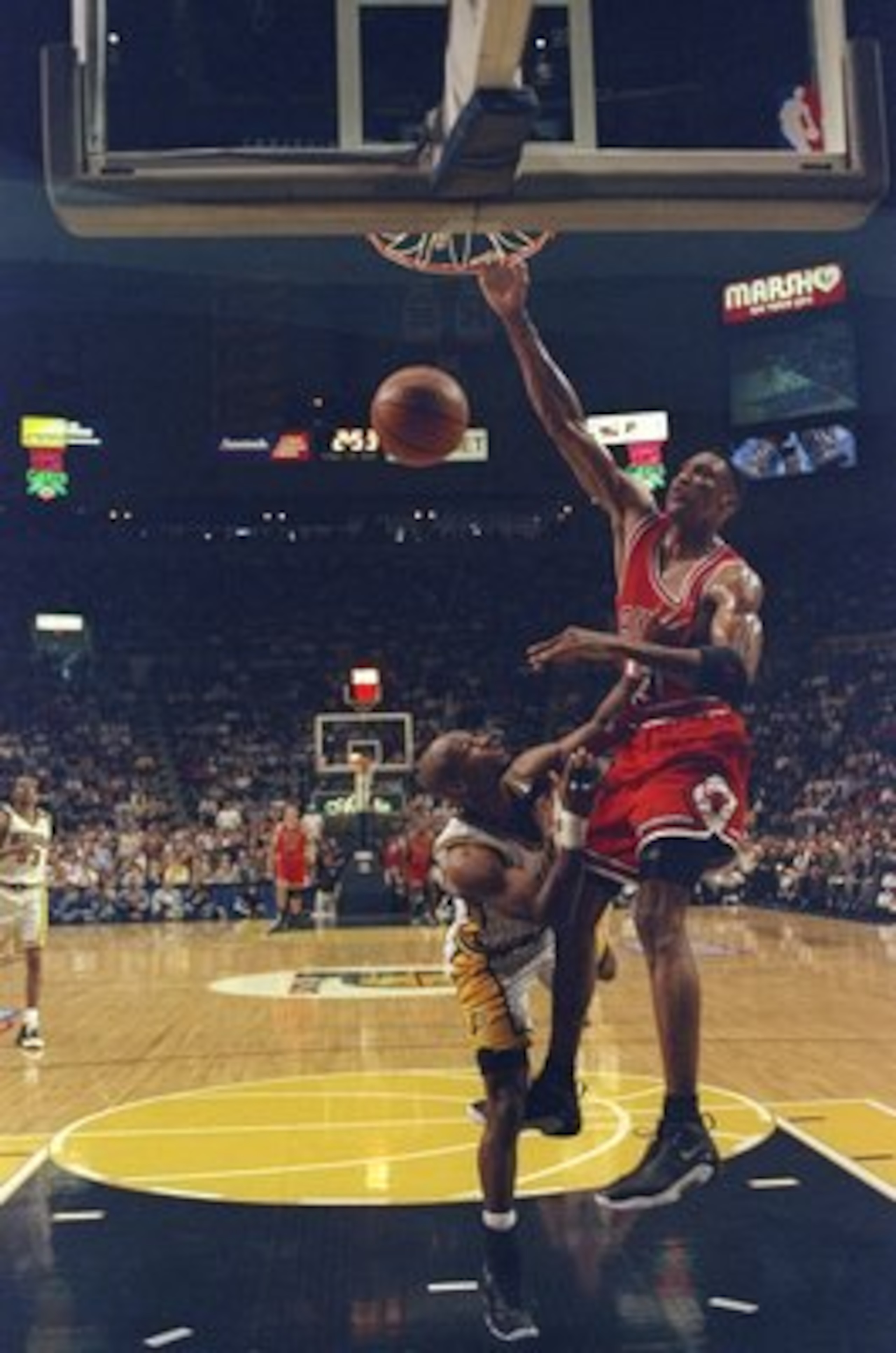 23 May, 1998:  Scottie Pippen #33 of the Chicago Bulls shoots as a member of the Indianapolis Pacers guards during the NBA Eastern Conference Finals at the Market Square Arena in Indianapolis, Indiana.  The Pacers defeated the Bulls 107-105. Mandatory Cre