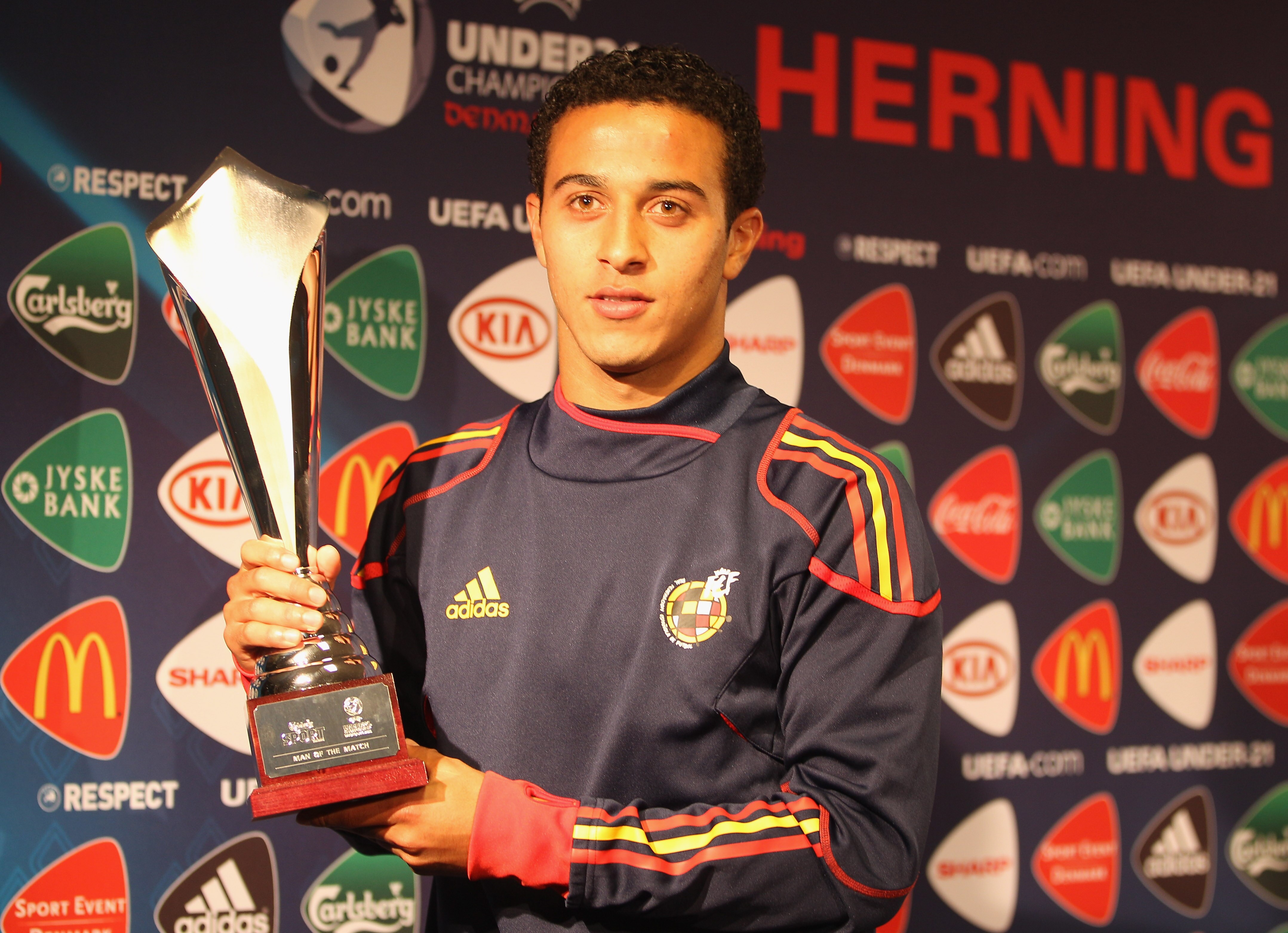 HERNING, DENMARK - JUNE 12: Thiago Alcantara of Spain receives the man of the match award after the UEFA European Under-21 Championship Group B match between England and Spain at the Herning Stadium on June 12, 2011 in Herning, Denmark.  (Photo by Michael