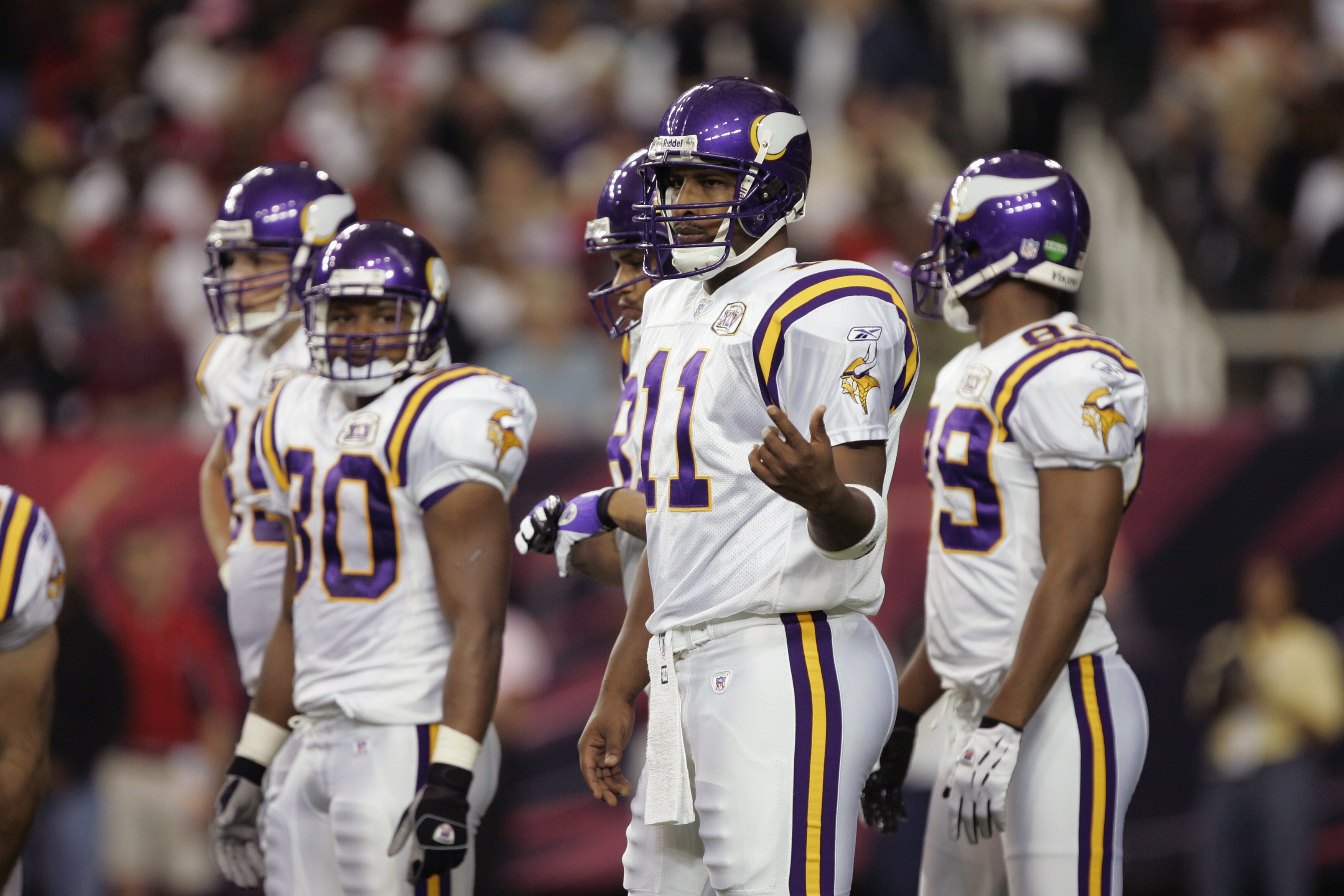 ATLANTA - OCTOBER 2:  Quarterback Daunte Culpepper #11 of the Minnesota Vikings waits for a play call from the sideline against the Atlanta Falcons on October 2, 2005 at the Georgia Dome in Atlanta, Georgia.  The Falcons won 30-10.  (Photo by Brian Bahr/G