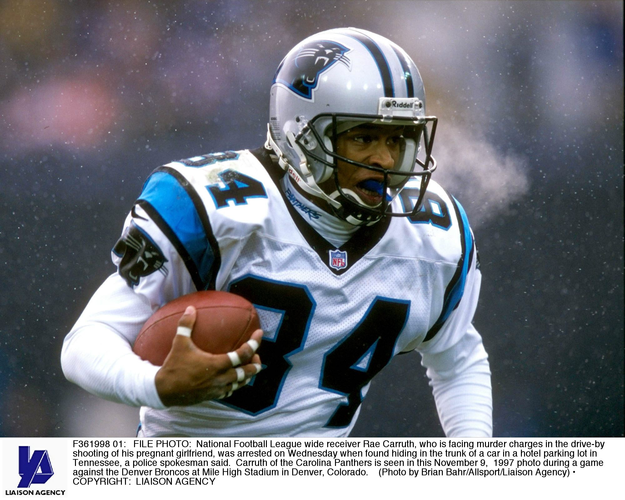 F361998 01: FILE PHOTO: National Football League wide receiver Rae Carruth, who is facing murder charges in the drive-by shooting of his pregnant girlfriend, was arrested on Wednesday when found hiding in the trunk of a car in a hotel parking lot in Tenne