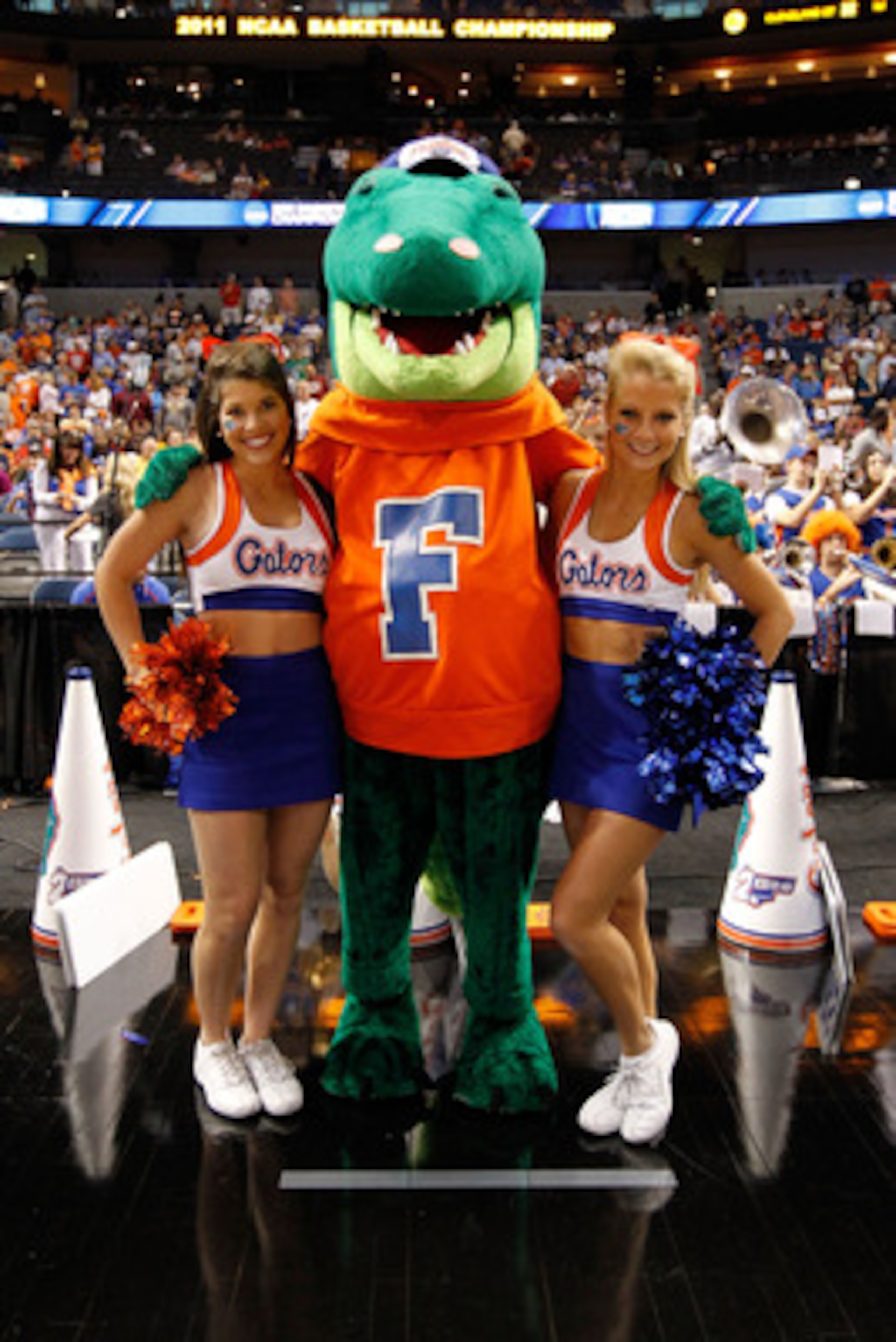 TAMPA, FL - MARCH 19: Albert, the mascot for the Florida Gators, poses for a photo with 2 FLorida cheerleaders against the UCLA Bruins during the third round of the 2011 NCAA men's basketball tournament at St. Pete Times Forum on March 19, 2011 in Tampa, TAMPA, FL - MARCH 19: Albert, the mascot for the Florida Gators, poses for a photo with 2 FLorida cheerleaders against the UCLA Bruins during the third round of the 2011 NCAA men's basketball tournament at St. Pete Times Forum on March 19, 2011 in Tampa,