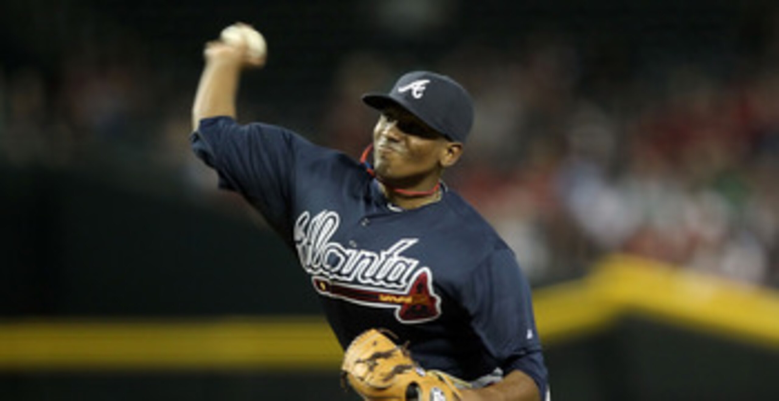 PHOENIX, AZ - MAY 18: Starting pitcher Julio Teheran #57 of the Atlanta Braves pitches against the Arizona Diamondbacks during the Major League Baseball game at Chase Field on May 18, 2011 in Phoenix, Arizona. The Diamondbacks defeated the Braves 5-4 in PHOENIX, AZ - MAY 18: Starting pitcher Julio Teheran #57 of the Atlanta Braves pitches against the Arizona Diamondbacks during the Major League Baseball game at Chase Field on May 18, 2011 in Phoenix, Arizona. The Diamondbacks defeated the Braves 5-4 in
