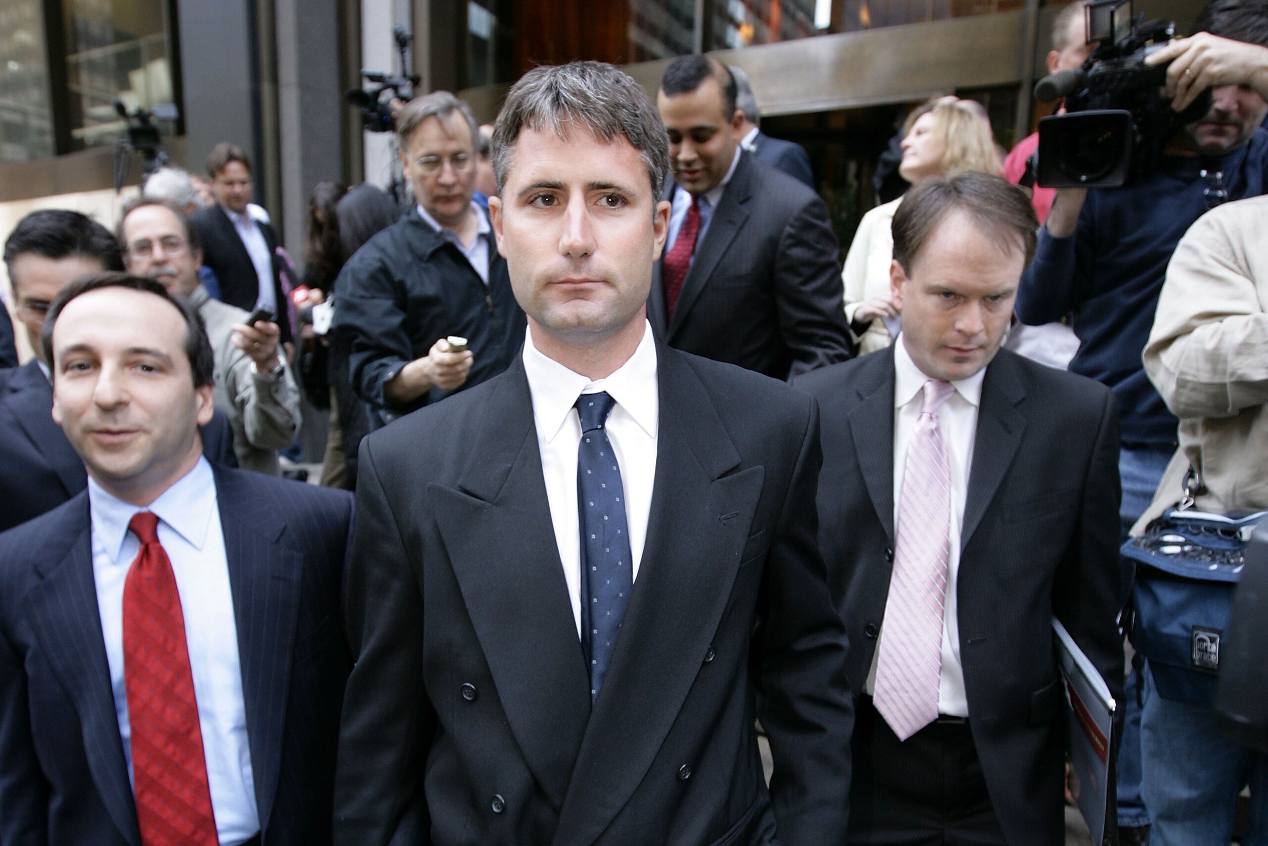 NEW YORK - MAY 13:  Former New England Patriots video operator Matthew Walsh (C) leaves NFL headquarters with his counsel Michael N. Levy (L) following a meeting with NFL commissioner Roger Goodell on May 13, 2008 in New York City. Walsh was there to disc
