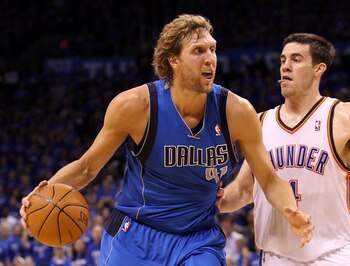 OKLAHOMA CITY, OK - MAY 23:  Dirk Nowitzki #41 of the Dallas Mavericks drives on Nick Collison #4 of the Oklahoma City Thunder in Game Four of the Western Conference Finals during the 2011 NBA Playoffs at Oklahoma City Arena on May 23, 2011 in Oklahoma Ci