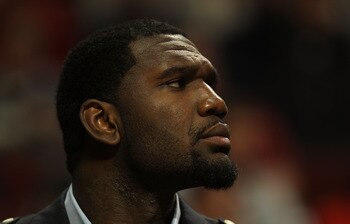 CHICAGO - NOVEMBER 01: Greg Oden #52 of the Portland Trail Blazers watches from the bench as his teammates take on the Chicago Bulls at the United Center on November 1, 2010 in Chicago, Illinois. The Bulls defeated the Trail Blazers 110-98. NOTE TO USER: