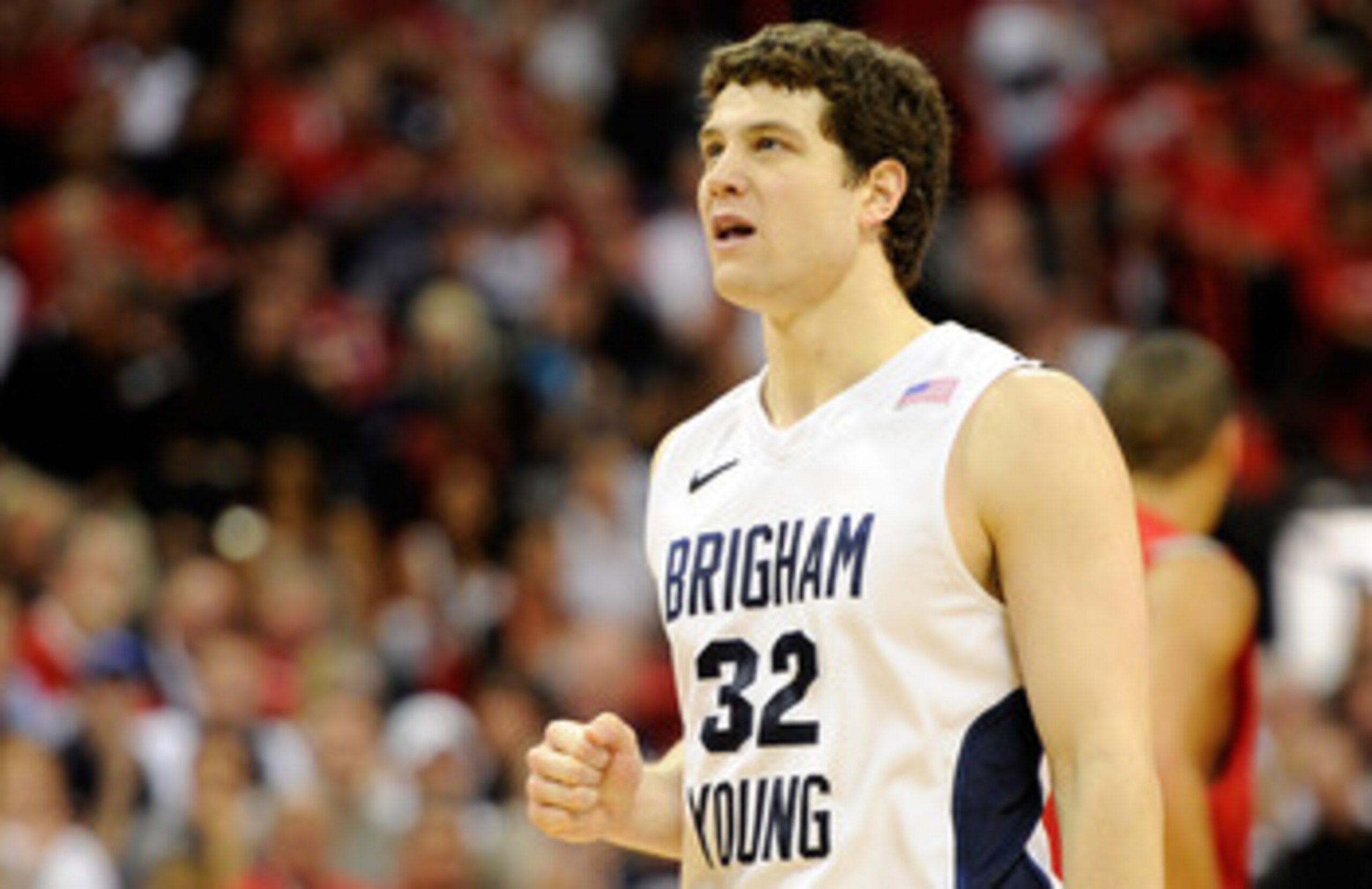LAS VEGAS, NV - MARCH 11:  Jimmer Fredette #32 of the Brigham Young University Cougars reacts during a semifinal game of the Conoco Mountain West Conference Basketball tournament against the New Mexico Lobos at the Thomas & Mack Center March 11, 2011 in L