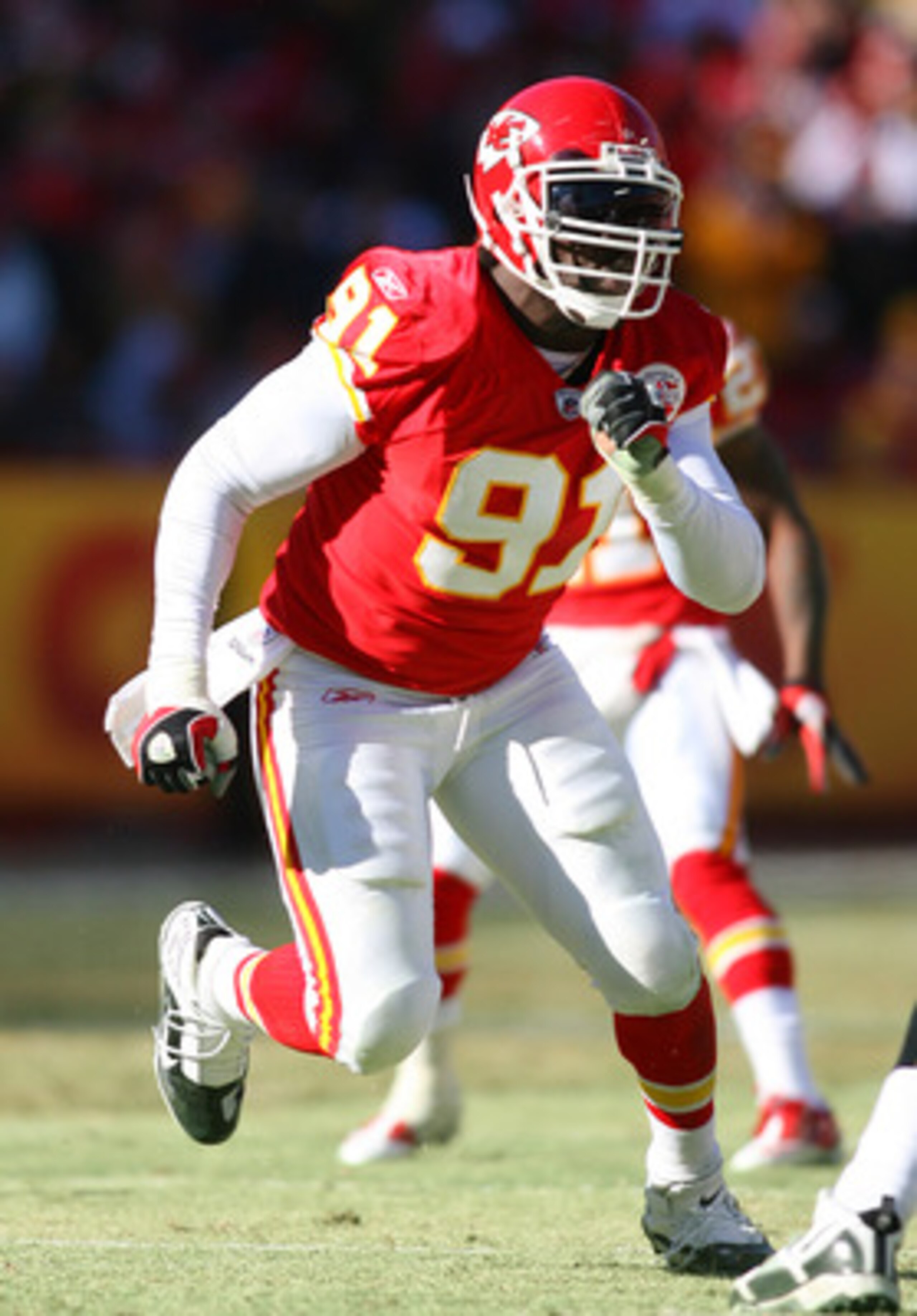 KANSAS CITY, MO - JANUARY 02:  Linebacker Tamba Hali #91 of the Kansas City Chiefs rushes the quarterback in a game against the Oakland Raiders at Arrowhead Stadium on January 2, 2011 in Kansas City, Missouri.  (Photo by Tim Umphrey/Getty Images)