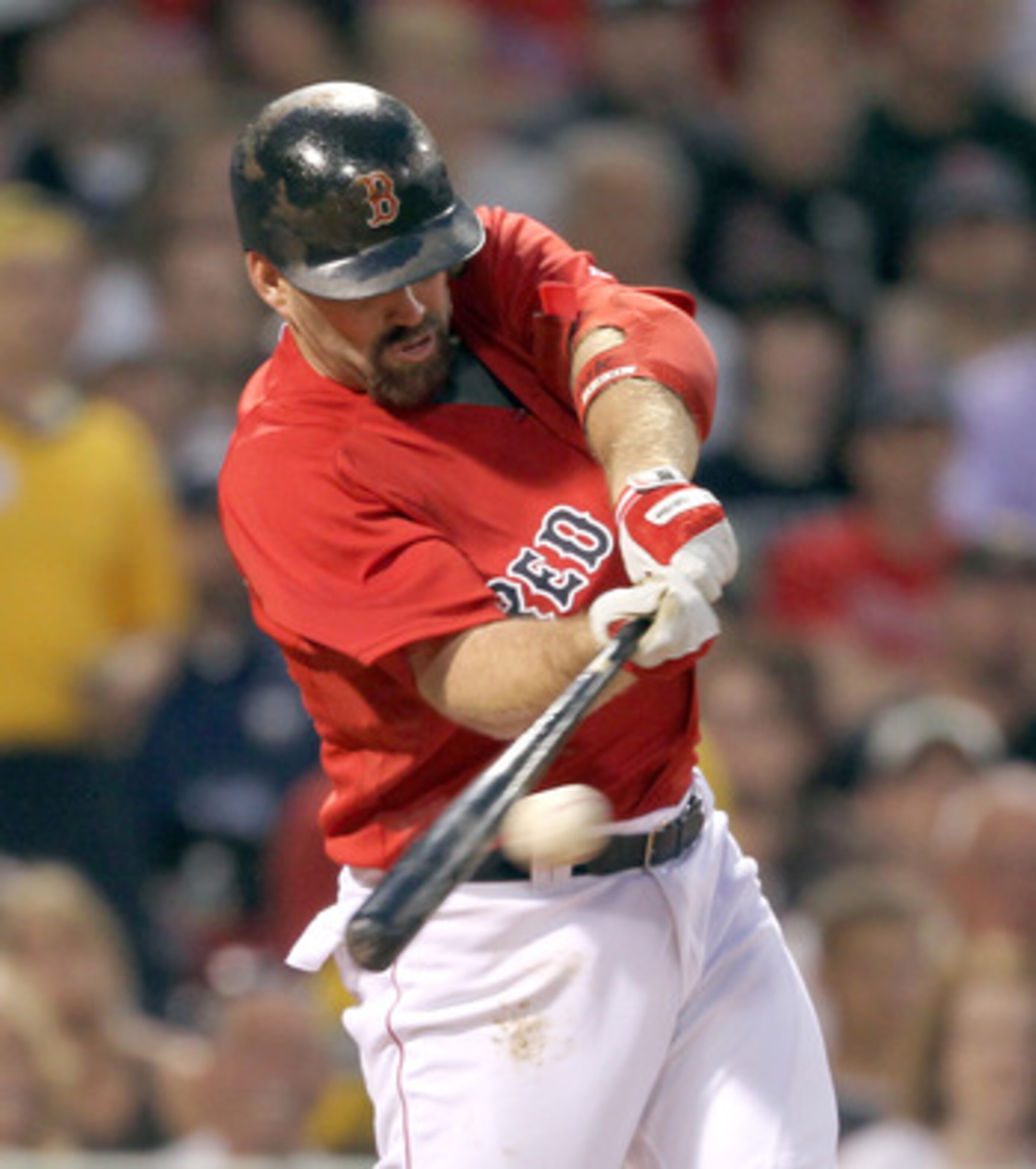 BOSTON, MA  - JUNE 17:  Kevin Youkillis #20 of the Boston Red Sox knocks in two runs in the third inning against the Milwaukee Brewers at Fenway Park on June 17, 2011 in Boston, Massachusetts.  (Photo by Jim Rogash/Getty Images)