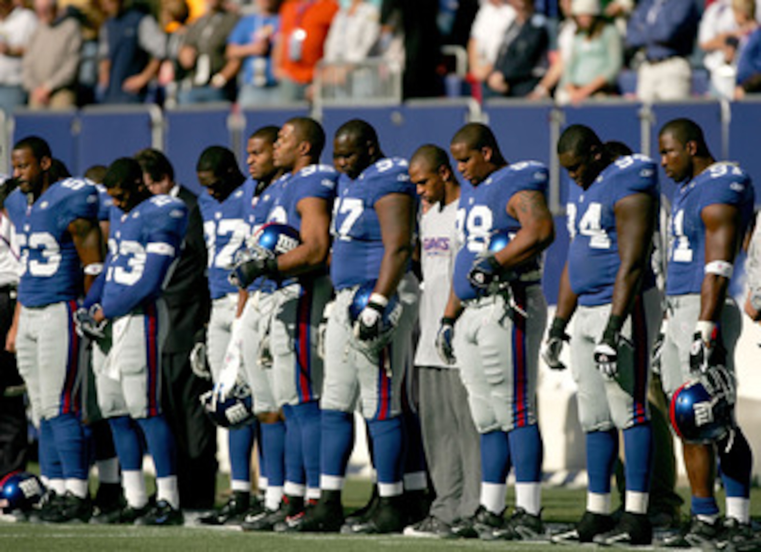 EAST RUTHERFORD, NJ - OCTOBER 30: The New York Giants take a moment of silence to honor Wellington Mara, the longtime owner of the Giants who passed away earlier this week, before their game against the Washington Redskins at Giants Stadium on October 30,