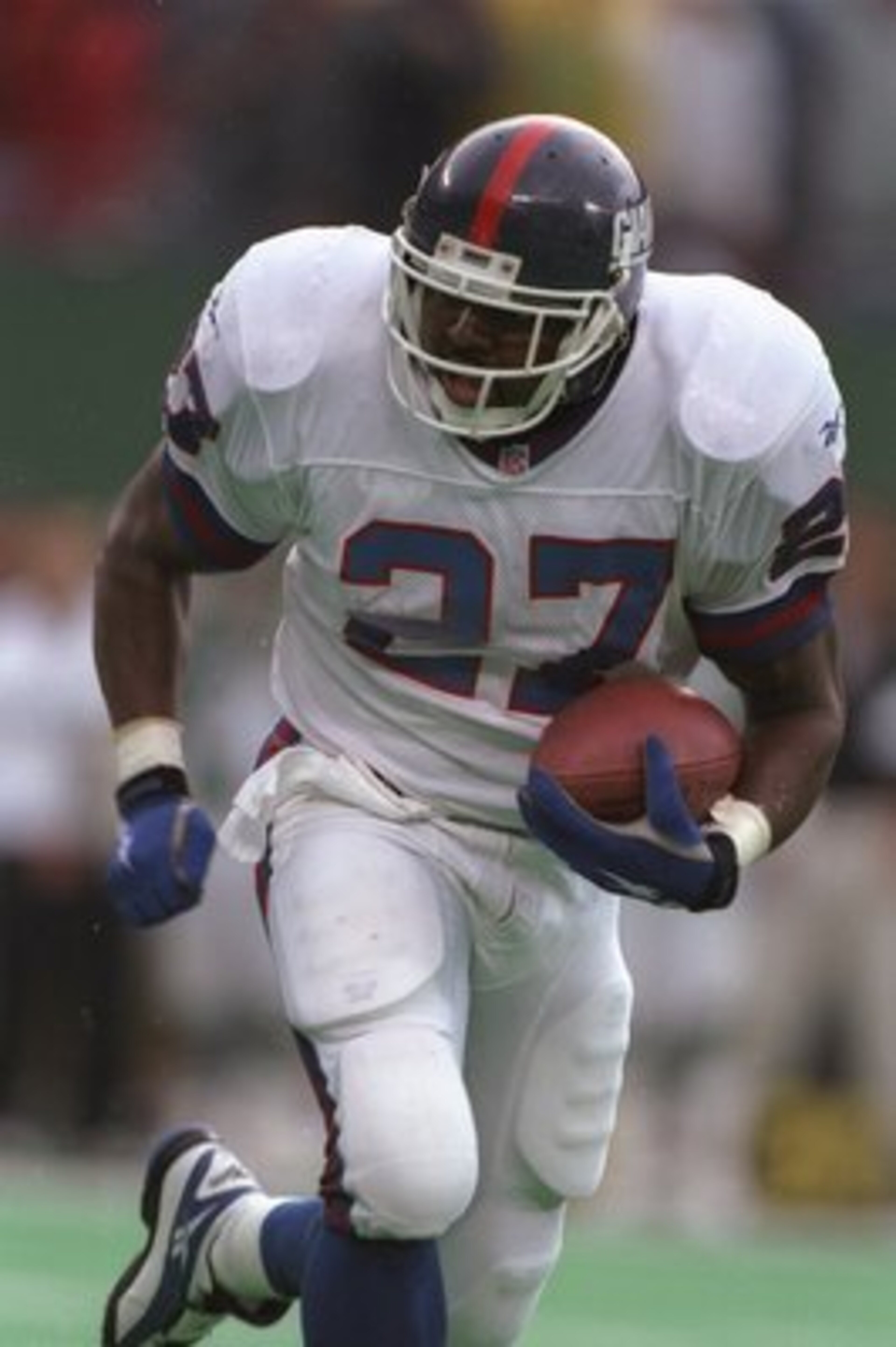 22 Sep 1996:  Running back Rodney Hampton of the New York Giants in action on the field as he runs with the football during a carry in  the Giants 13-6 victory over the New York Jets at Giants Stadium in East Rutherford, New Jersey.  Mandatory Credit: Al