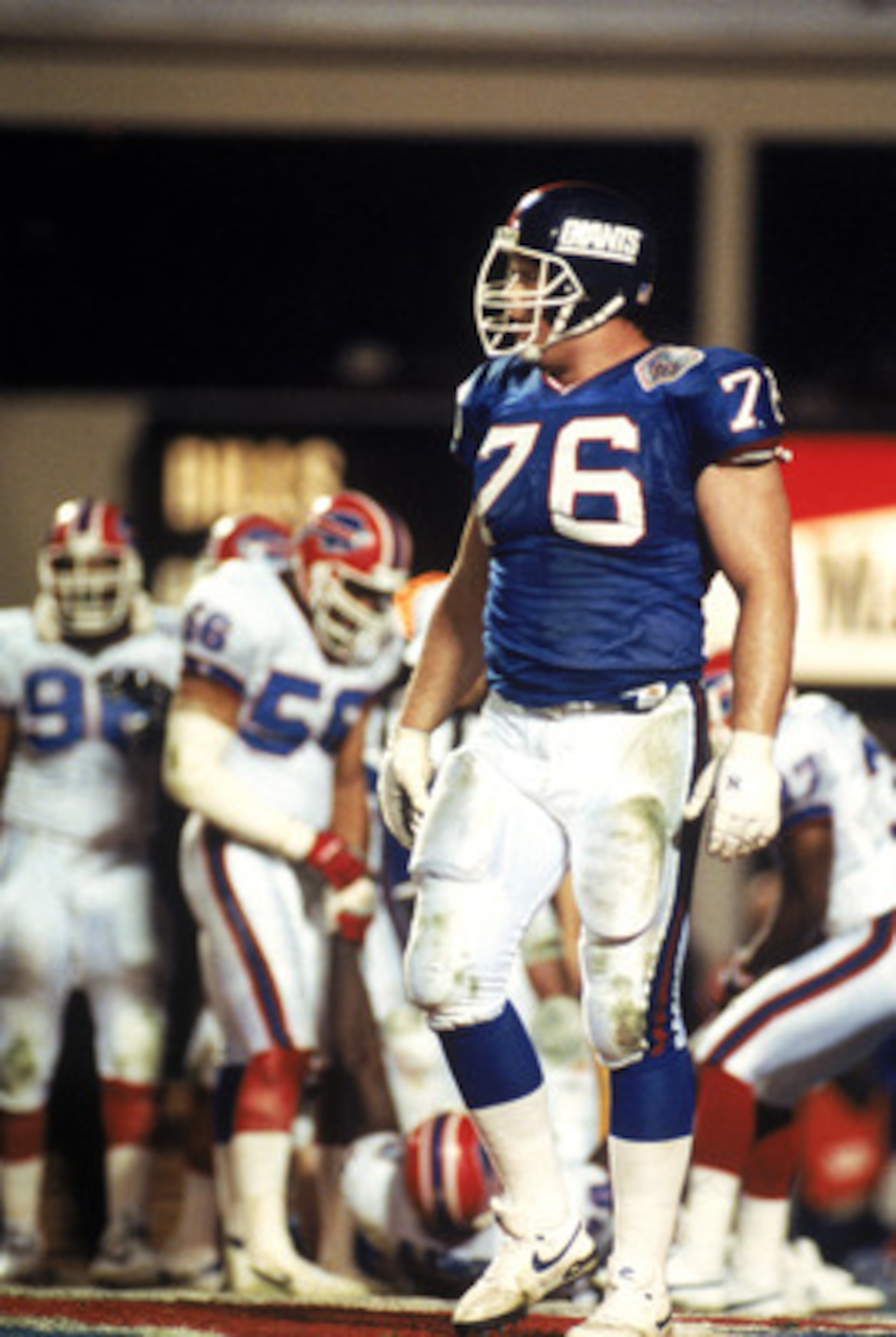 TAMPA, FL - JANUARY 27:  Offensive tackle Jumbo Elliott #76 of the New York Giants stands on the field against the Buffalo Bills during Super Bowl XXV at Tampa Stadium on January 27, 1991 in Tampa, Florida. The Giants defeated the Bills 20-19.  (Photo by
