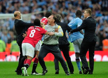 LONDON, ENGLAND - APRIL 16:  Attilio Lombardo and David Platt of Man City clashes with Anderson of Man  Utd at the final whistle during the FA Cup sponsored by E.ON semi final match between Manchester City and Manchester United at Wembley Stadium on April