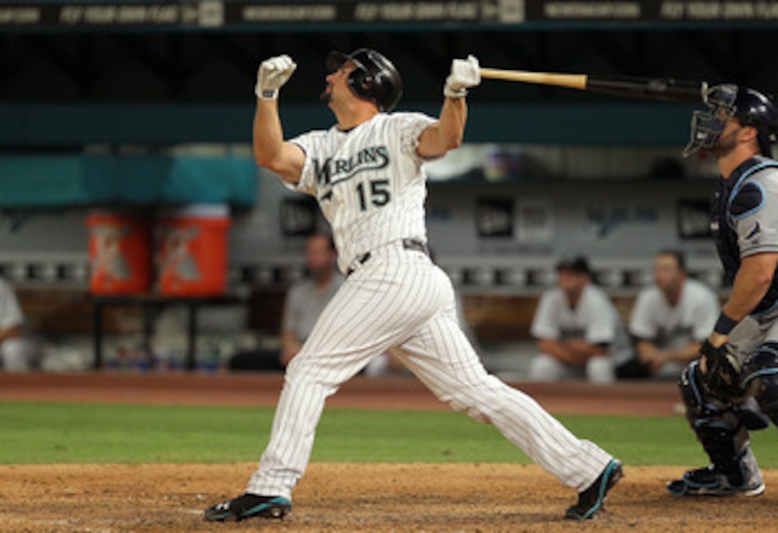 MIAMI GARDENS, FL - MAY 20:  Gaby Sanchez #15 of the Florida Marlins hits a sac fly during a game against the Tampa Bay Rays at Sun Life Stadium on May 20, 2011 in Miami Gardens, Florida.  (Photo by Mike Ehrmann/Getty Images)