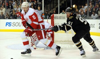 DALLAS - JANUARY 12: Defenseman Nicklas Lidstrom #5 of the Detroit Red Wings skates the puck past Brad Richards #91 of the Dallas Stars at the American Airlines Center on January 12, 2009 in Dallas, Texas. (Photo by Ronald Martinez/Getty Images) DALLAS - JANUARY 12: Defenseman Nicklas Lidstrom #5 of the Detroit Red Wings skates the puck past Brad Richards #91 of the Dallas Stars at the American Airlines Center on January 12, 2009 in Dallas, Texas. (Photo by Ronald Martinez/Getty Images)
