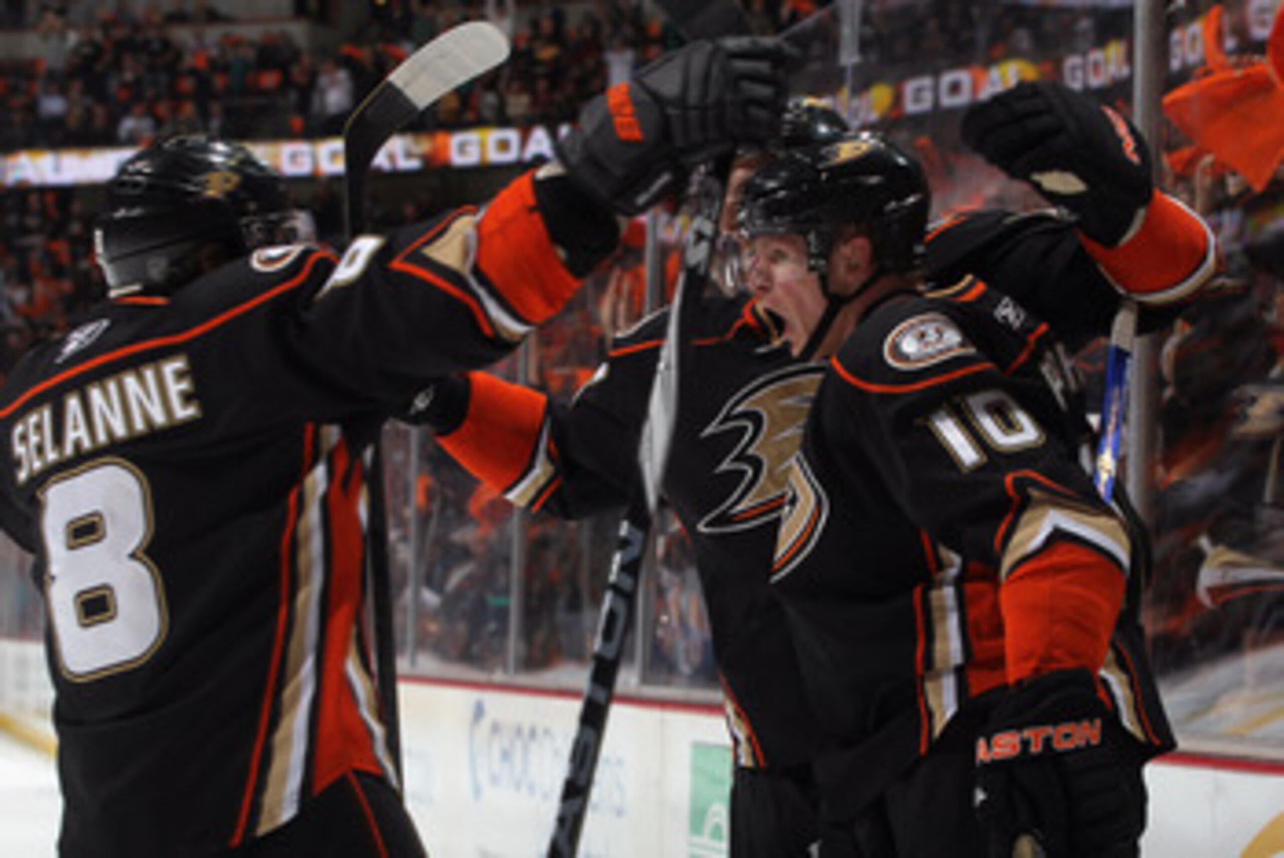 ANAHEIM, CA - APRIL 15:  Corey Perry (R) #10 of the Anaheim Ducks celebrates a goal with Teemu Selanne #8 in the first period against the Nashville Predators in Game Two of the Western Conference Quarterfinals during the 2011 NHL Stanley Cup Playoffs at H