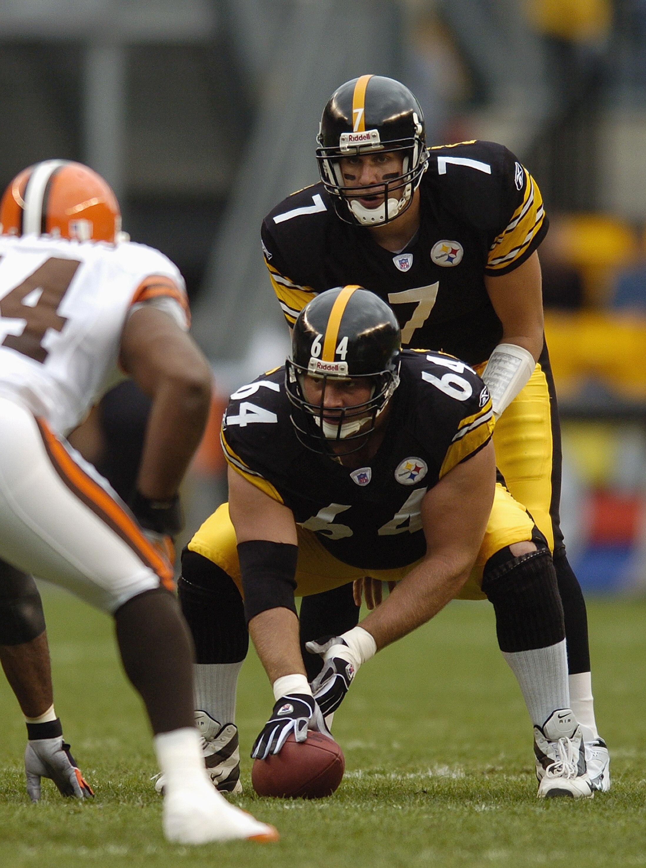 PITTSBURGH - OCTOBER 10:  Quarterback Ben Roethlisberger #7 of the Pittsburgh Steelers waits for the snap from center Jeff Hartings #64 during the game against the Cleveland Browns at Heinz Field on October 10, 2004 in Pittsburgh, Pennsylvania. The Steele