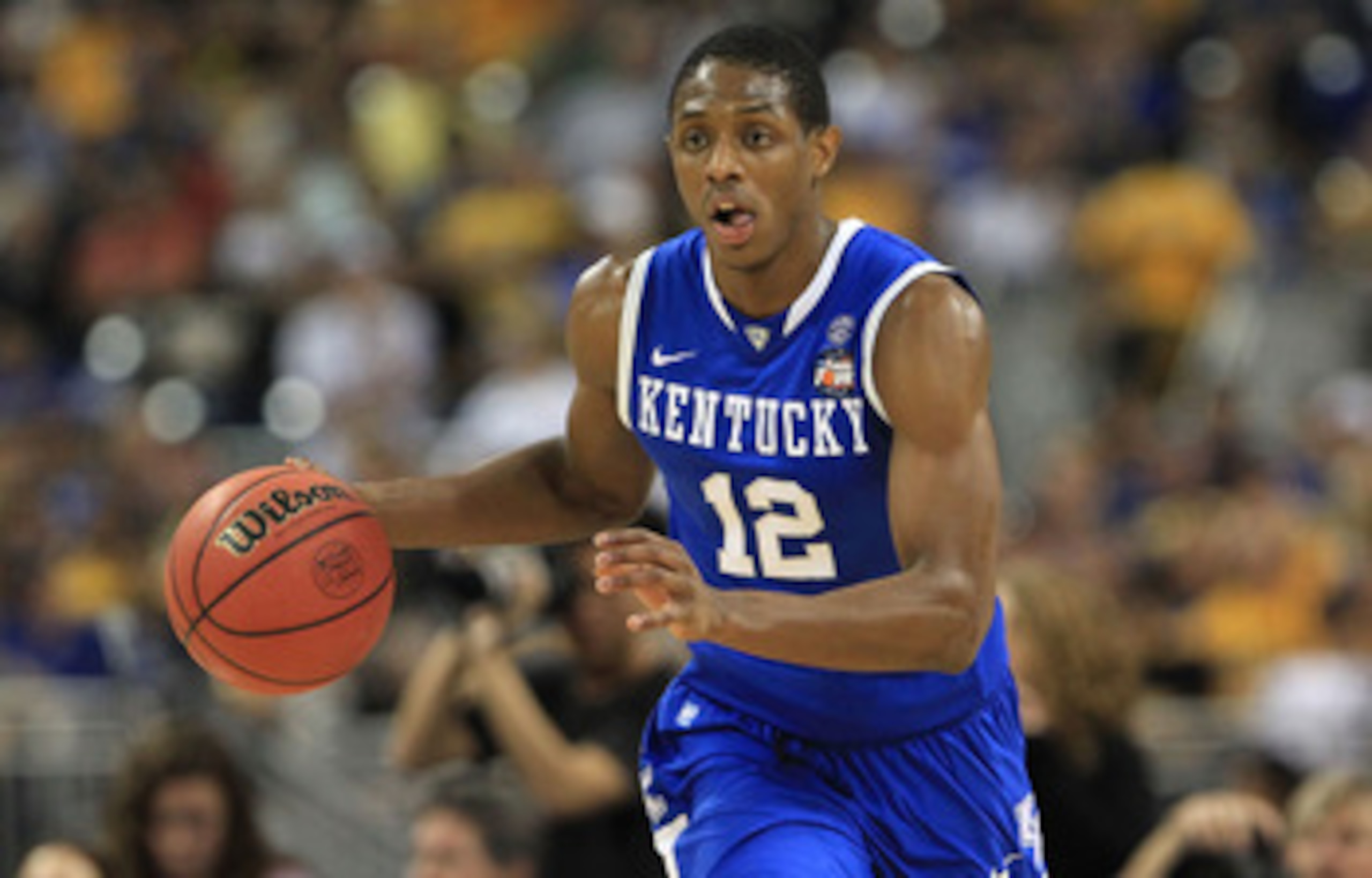 HOUSTON, TX - APRIL 02:  Brandon Knight #12 of the Kentucky Wildcats moves the ball while taking on the Connecticut Huskies during the National Semifinal game of the 2011 NCAA Division I Men's Basketball Championship at Reliant Stadium on April 2, 2011 in