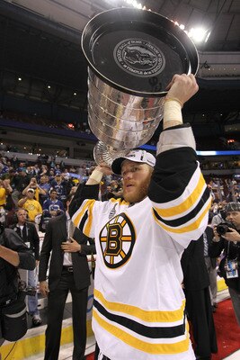 VANCOUVER, BC - JUNE 15: Shawn Thornton #22 of the Boston Bruins celebrates with the Stanley Cup after defeating the Vancouver Canucks in Game Seven of the 2011 NHL Stanley Cup Final at Rogers Arena on June 15, 2011 in Vancouver, British Columbia, Canada VANCOUVER, BC - JUNE 15: Shawn Thornton #22 of the Boston Bruins celebrates with the Stanley Cup after defeating the Vancouver Canucks in Game Seven of the 2011 NHL Stanley Cup Final at Rogers Arena on June 15, 2011 in Vancouver, British Columbia, Canada