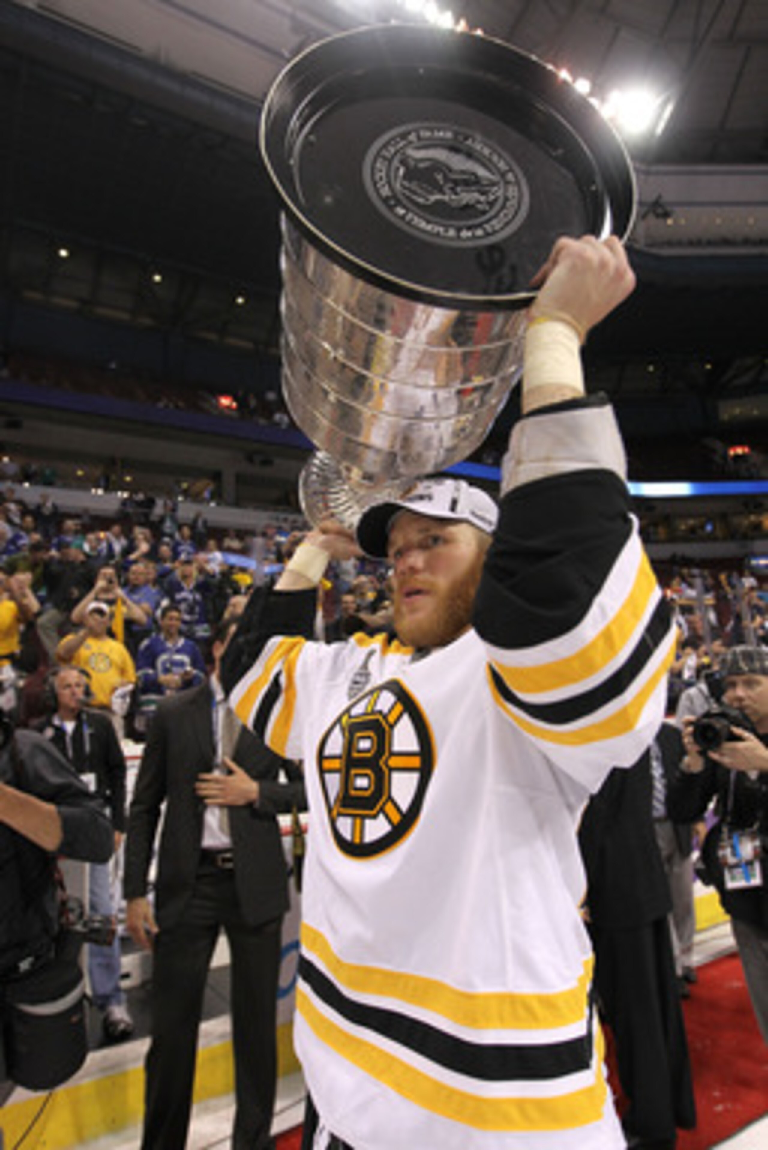 VANCOUVER, BC - JUNE 15:  Shawn Thornton #22 of the Boston Bruins celebrates with the Stanley Cup after defeating the Vancouver Canucks in Game Seven of the 2011 NHL Stanley Cup Final at Rogers Arena on June 15, 2011 in Vancouver, British Columbia, Canada