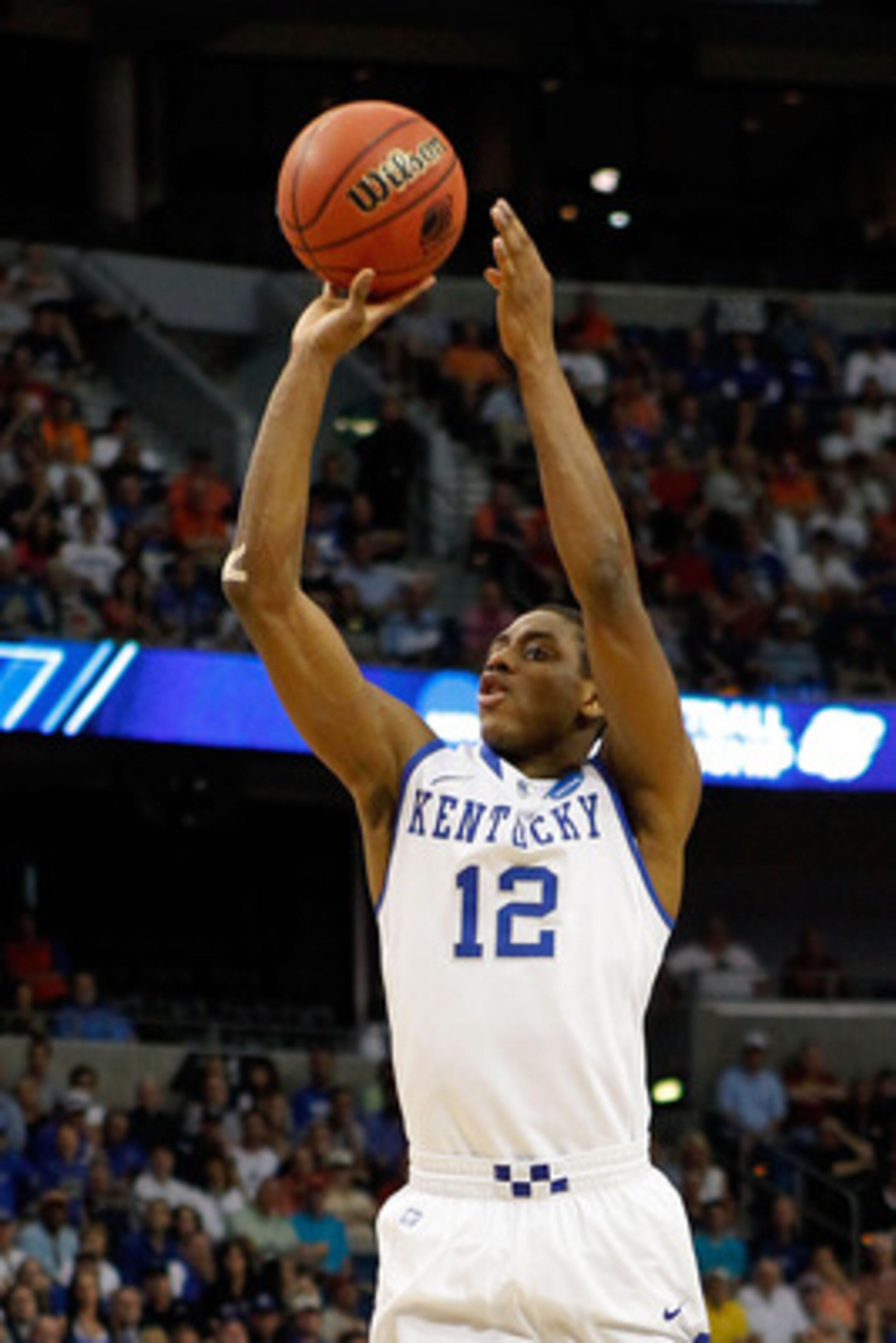 TAMPA, FL - MARCH 19:  Brandon Knight #12 of the Kentucky Wildcats attempts a shot against the West Virginia Mountaineers during the third round of the 2011 NCAA men's basketball tournament at St. Pete Times Forum on March 19, 2011 in Tampa, Florida. Kent