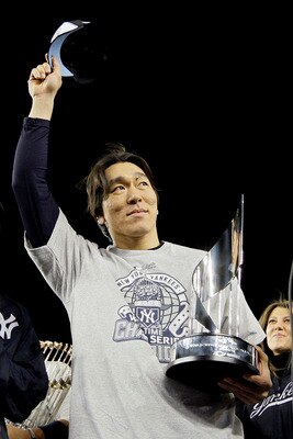 NEW YORK - NOVEMBER 4:  World Series MVP Hideki Matsui #55 of the New York Yankees celebrates with the MVP trophy after their 7-3 win against the Philadelphia Phillies in Game Six of the 2009 MLB World Series at Yankee Stadium on November 4, 2009 in the B