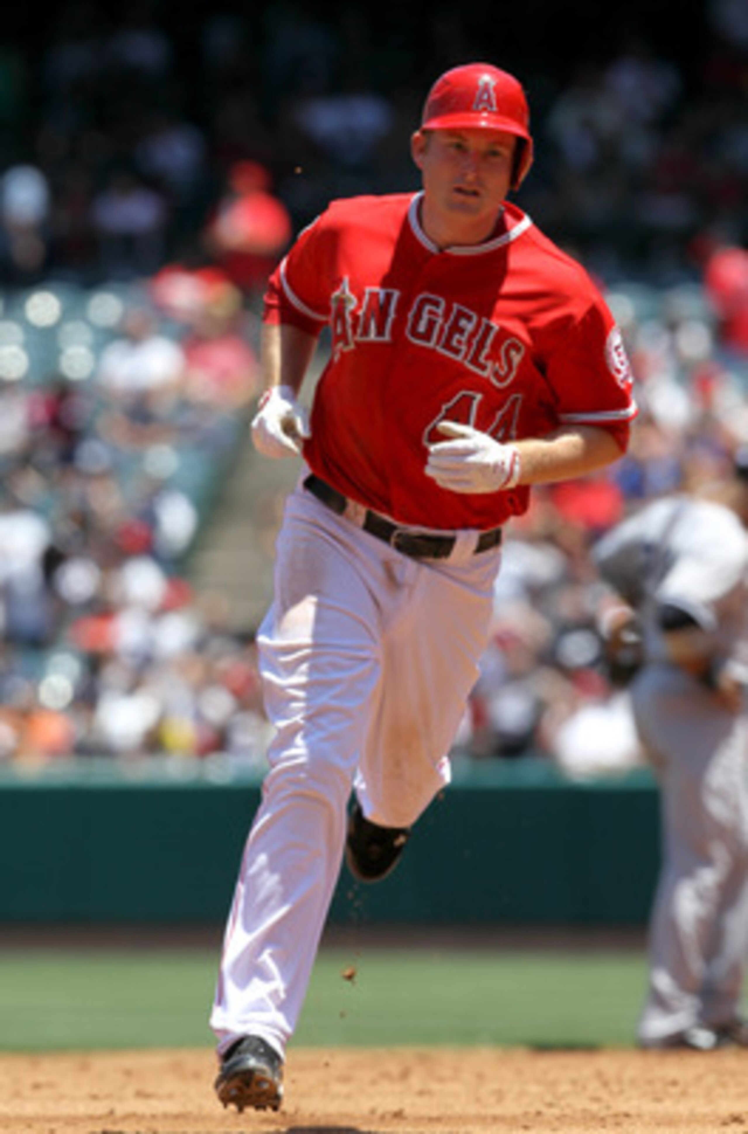 ANAHEIM, CA - JUNE 5:  Mark Trumbo #44 of the Los Angeles Angels of Anaheim circles the bases after hitting a ome run in the third inning against the New York Yankees on June 5, 2011 at Angel Stadium in Anaheim, California. The Yankees won 5-3.  (Photo by