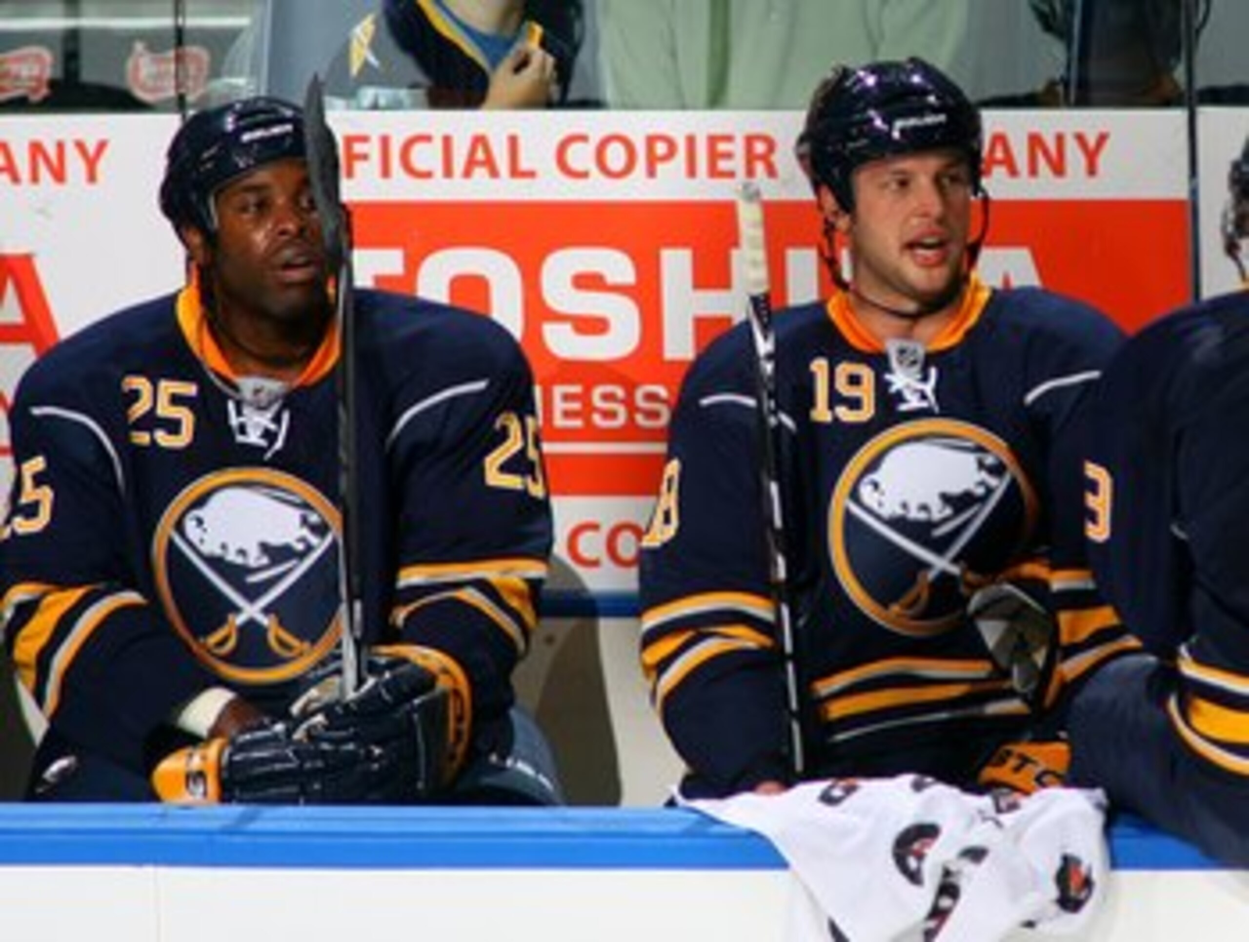 BUFFALO, NY - OCTOBER 3:  Mike Grier #25 and Tim Connolly #19 of the Buffalo Sabres looks on from the bench area during a break in NHL game action against the Montreal Canadiens at HSBC Arena on October 3, 2009 in Buffalo, New York. The Canadiens defeated