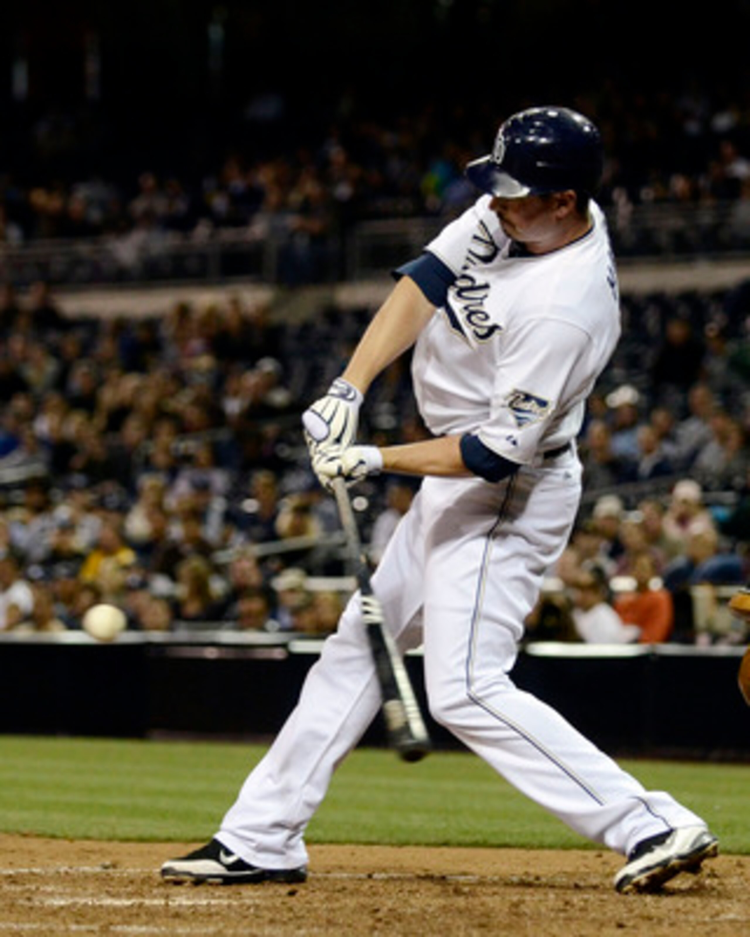 SAN DIEGO, CA-JUNE 2: Brad Hawpe #11 of the San Diego Padres connects for a single during the sixth inning of a baseball game against the Houston Astros at Petco Park on June 2, 2011 in San Diego, California. (Photo by Denis Poroy/Getty Images) SAN DIEGO, CA-JUNE 2: Brad Hawpe #11 of the San Diego Padres connects for a single during the sixth inning of a baseball game against the Houston Astros at Petco Park on June 2, 2011 in San Diego, California. (Photo by Denis Poroy/Getty Images)