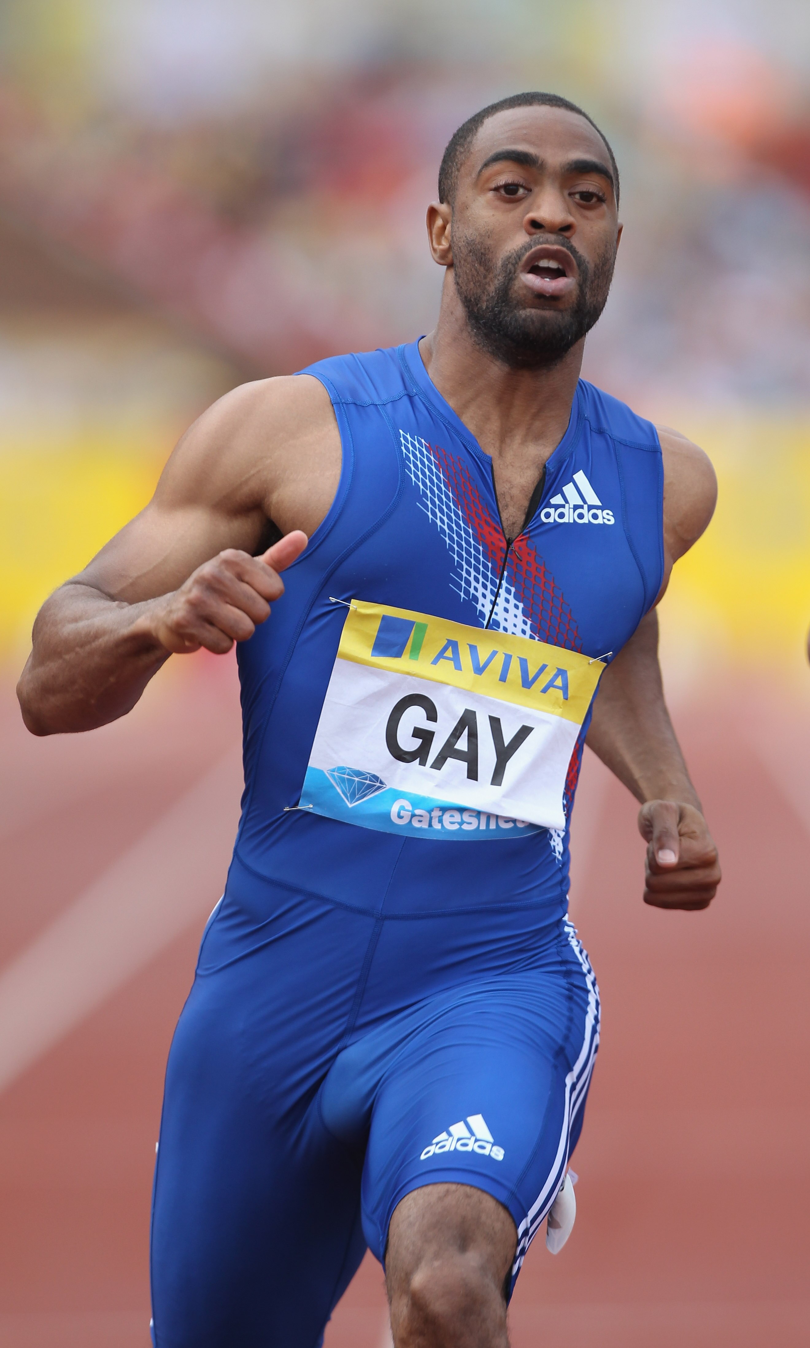 GATESHEAD, ENGLAND - JULY 10:  Tyson Gay of USA in action in the men's 100m Final during the Aviva British Grand Prix at Gateshead International Stadium on July 10, 2010 in Gateshead, England. Tyson Gay won in a time of 9.93 seconds. (Photo by Ian Walton/
