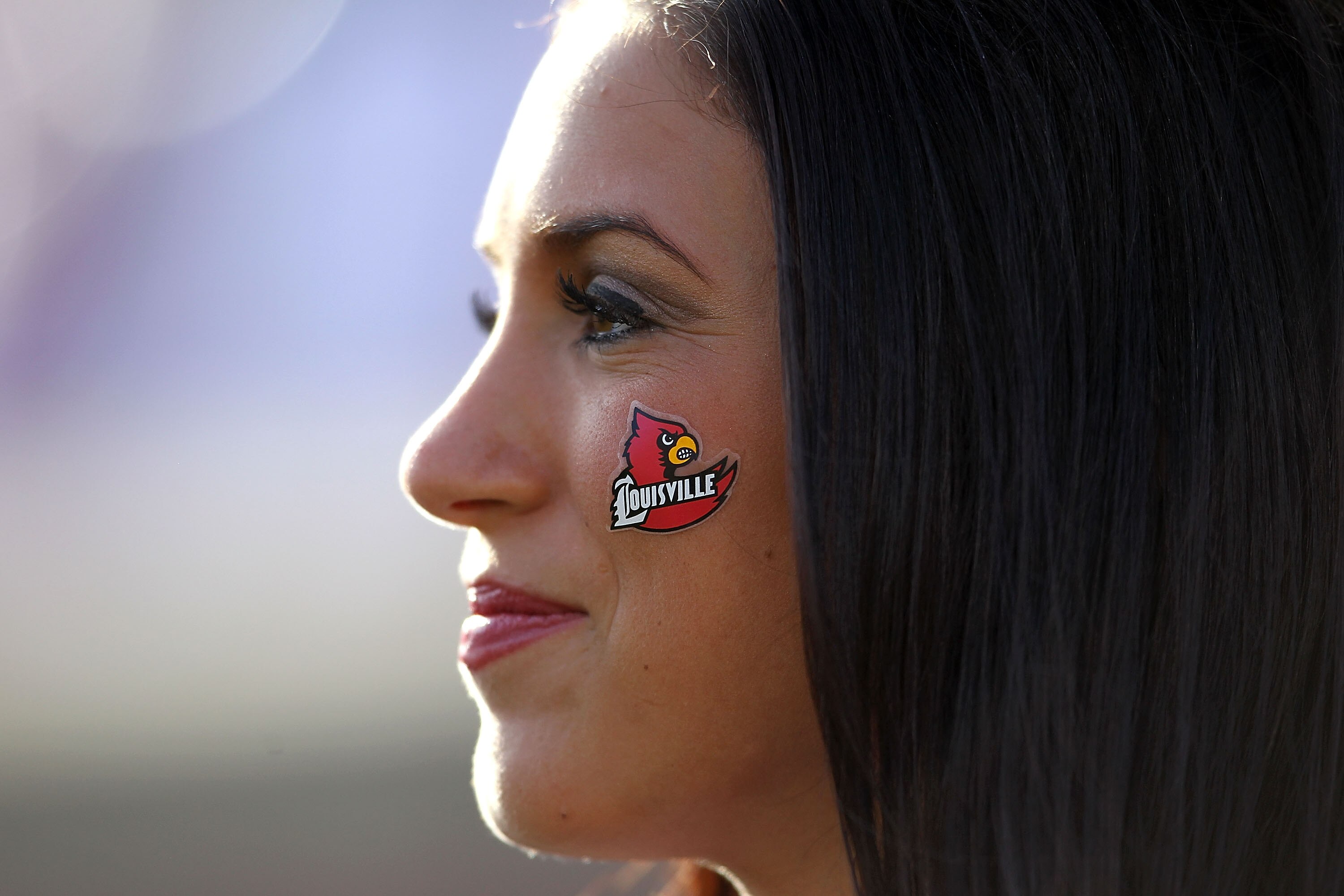 LOUISVILLE, KY - NOVEMBER 20:  A Louisville Cardinals cheerleader watches the Big East Conference game against the West Virginia Mountaineers at Papa John's Cardinal Stadium on November 20, 2010 in Louisville, Kentucky.  (Photo by Andy Lyons/Getty Images)