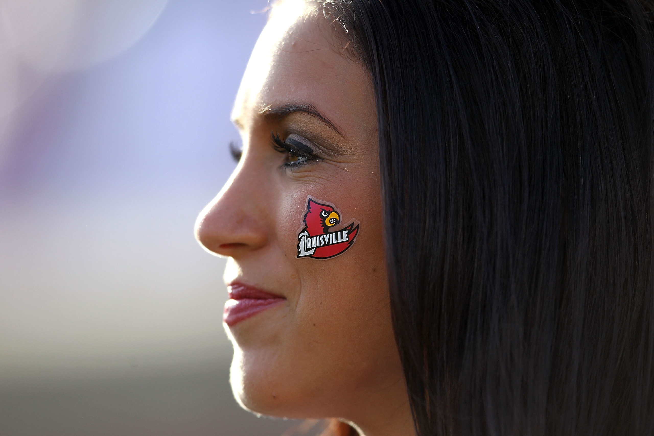 LOUISVILLE, KY - NOVEMBER 20:  A Louisville Cardinals cheerleader watches the Big East Conference game against the West Virginia Mountaineers at Papa John's Cardinal Stadium on November 20, 2010 in Louisville, Kentucky.  (Photo by Andy Lyons/Getty Images)