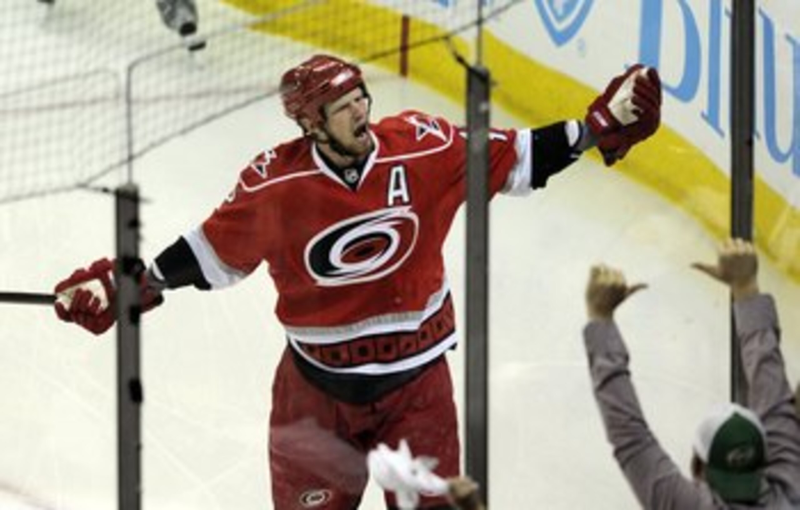 RALEIGH, NC - MAY 26:  Eric Staal #12 of the Carolina Hurricanes celebrates his first period goal against the Pittsburgh Penguins during Game Four of the Eastern Conference Championship Round of the 2009 Stanley Cup Playoffs at RBC Center on May 26, 2009