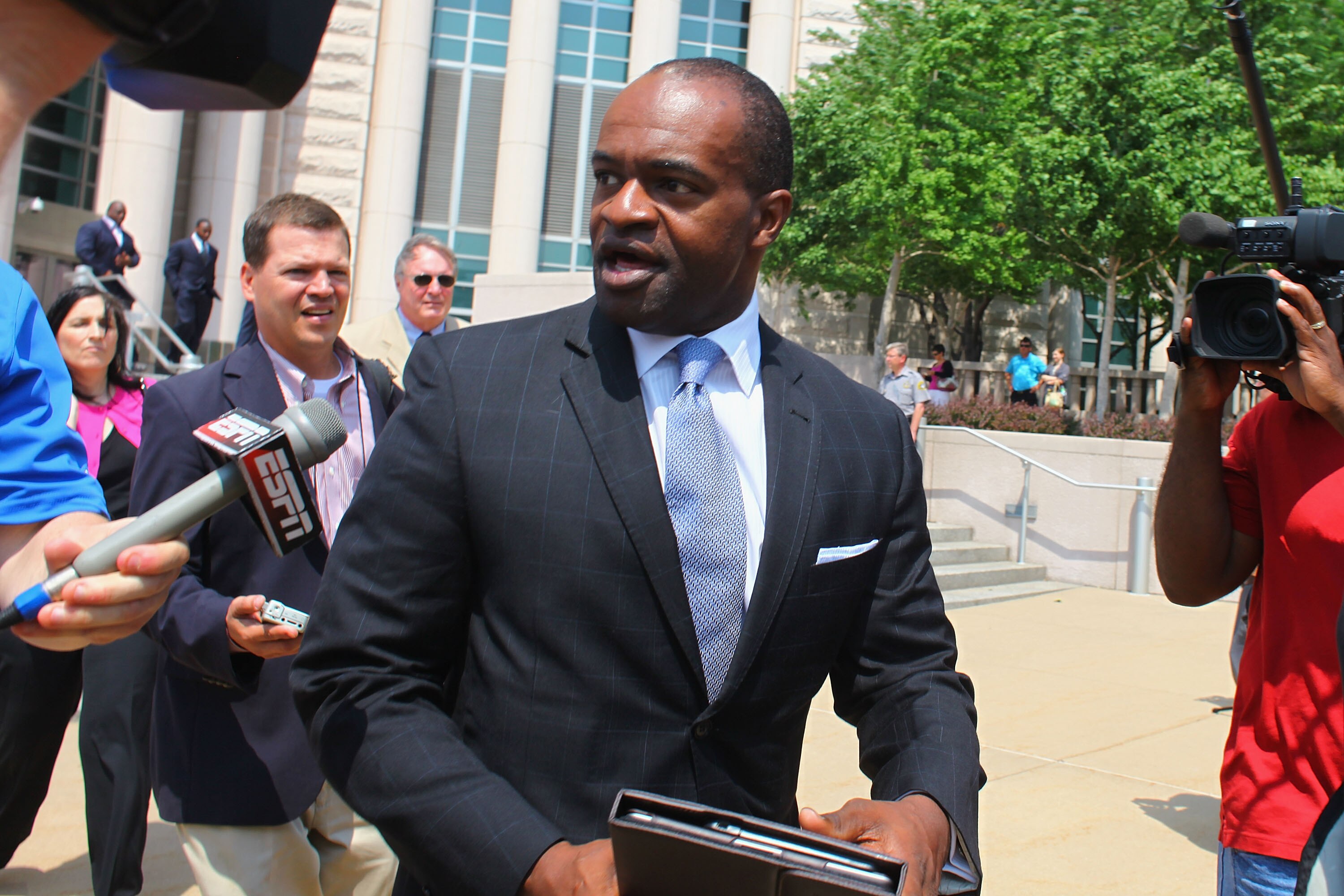 ST. LOUIS, MO - JUNE 3: Executive Director of the National Football League Players' Association (NFLPA) DeMaurice Smith leaves the Thomas F. Eagleton U.S. Federal Courthouse after the NFL lockout hearing on June 3, 2011 in St. Louis, Missouri. NFL players