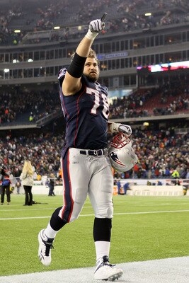 FOXBORO, MA - DECEMBER 19:  Sebastian Vollmer #76 of the New England Patriots celebrates as he runs off the field after defeating the Green Bay Packers 31-27 at Gillette Stadium on December 19, 2010 in Foxboro, Massachusetts.  (Photo by Elsa/Getty Images)