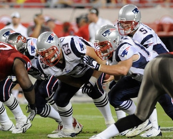 TAMPA, FL - AUGUST 17: Guard Dan Connolly #63 of the New England Patriots sets to block against the Tampa Bay Buccaneers at Raymond James Stadium on August 17, 2008 in Tampa, Florida. (Photo by Al Messerschmidt/Getty Images)