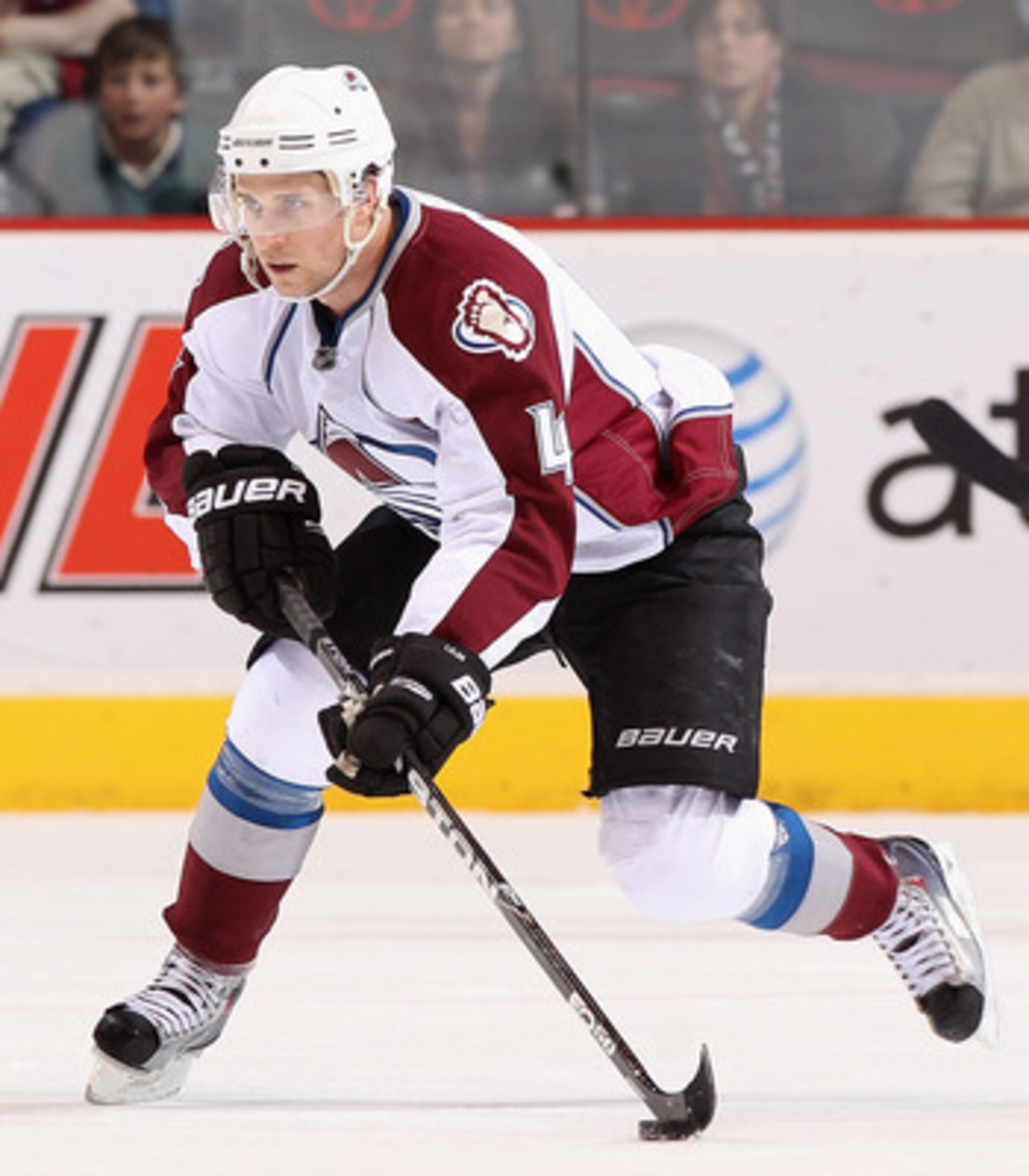 GLENDALE, AZ - APRIL 01:  John-Michael Liles #4 of the Colorado Avalanche skates with the puck during the NHL game against the Phoenix Coyotes at Jobing.com Arena on April 1, 2011 in Glendale, Arizona.  The Avalanche defeated the Coyotes 4-3 in an overtim