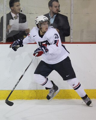 LAKE PLACID, NY - AUGUST 04:  Beau Bennett #23 of Team USA skates against Team Finland at the USA Hockey National Evaluation Camp on August 4, 2010 in Lake Placid, New York. The USA defeated Finland 6-3.  (Photo by Bruce Bennett/Getty Images)