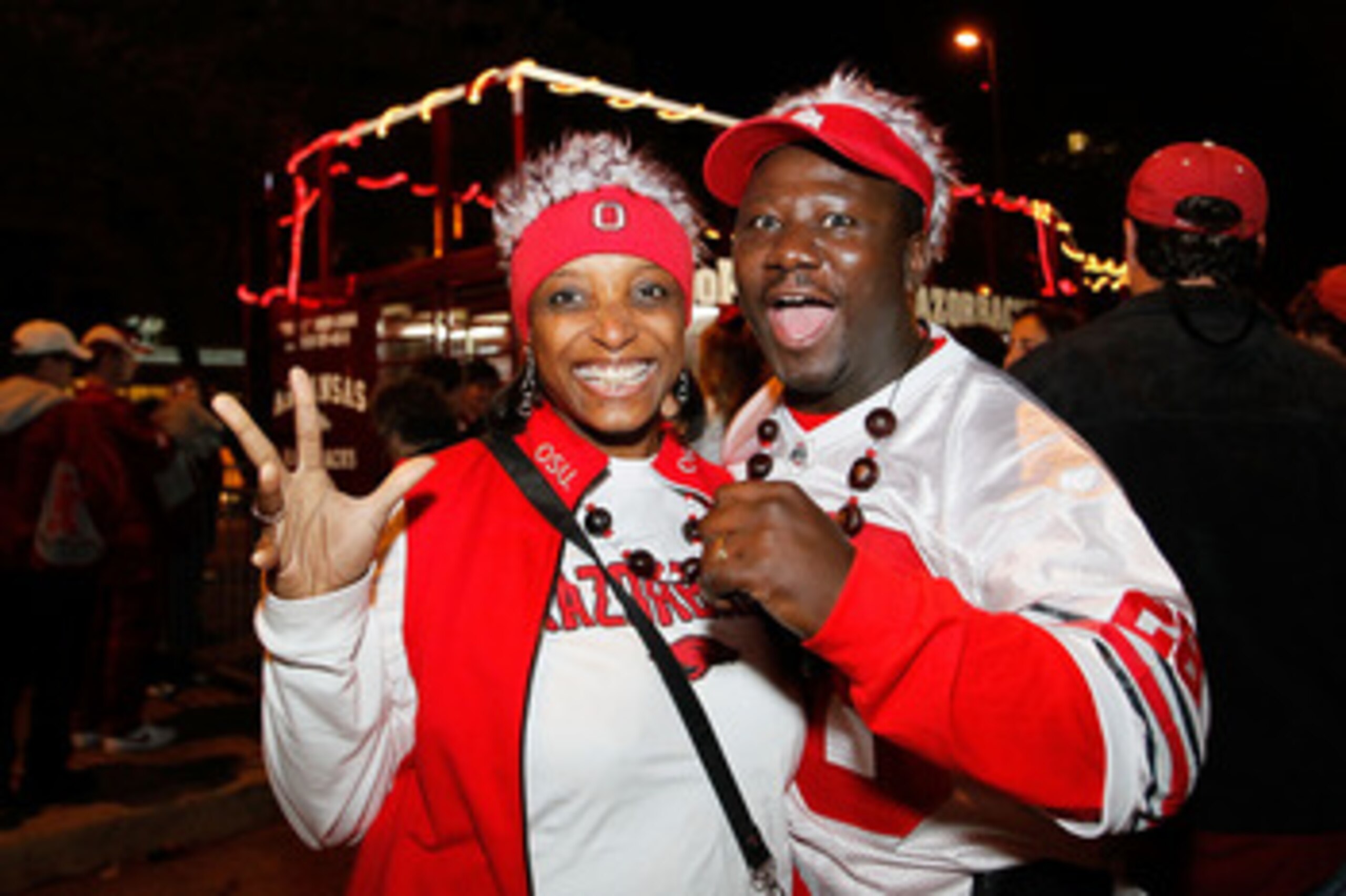 NEW ORLEANS, LA - JANUARY 04:  Fans pose before the Allstate Sugar Bowl between the Arkansas Razorbacks and the Ohio State Buckeyes at the Louisiana Superdome on January 4, 2011 in New Orleans, Louisiana.  (Photo by Kevin C. Cox/Getty Images)