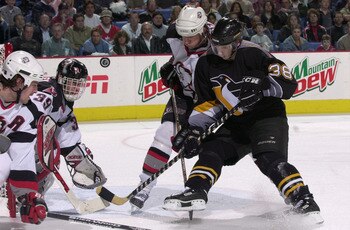 26 Apr 2001:  Jan Hrdina #38 of the Pittsburgh Penguins takes a shot on goalie Dominik Hasek #39 of the Buffalo Sabres during Game on1e of the Eastern Conference semifinals in the Stanley Cup playoffs at the HSBC Arena in Buffalo, New York. The Penguins w