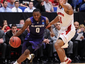 TUCSON, AZ - MARCH 19:  Jacob Pullen #0 of the Kansas State Wildcats drives against Jordan Taylor #11 of the Wisconsin Badgers during the third round of the 2011 NCAA men's basketball tournament at McKale Center on March 19, 2011 in Tucson, Arizona.  (Pho