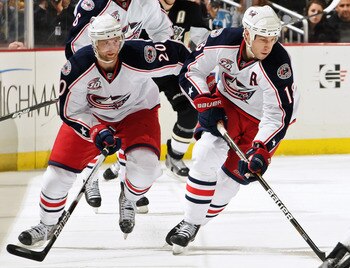 PITTSBURGH, PA - FEBRUARY 8: R.J. Umberger #18 of the Columbus Blue Jackets skates with the puck against the Pittsburgh Penguins as Kristian Huselius #20 of the Columbus Blue Jackets follows on February 8, 2011 at CONSOL Energy Center in Pittsburgh, Penn PITTSBURGH, PA - FEBRUARY 8: R.J. Umberger #18 of the Columbus Blue Jackets skates with the puck against the Pittsburgh Penguins as Kristian Huselius #20 of the Columbus Blue Jackets follows on February 8, 2011 at CONSOL Energy Center in Pittsburgh, Penn