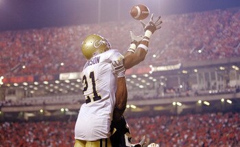 AUBURN, AL - SEPTEMBER 3:  Wide receiver Calvin Johnson #21 of the Georgia Tech Yellow Jackets fails to catch a pass in the end zone against defensive back Patrick Lee #20 of the Auburn Tigers in the fourth quarter on September 3, 2005 at Jordan-Hare Stad