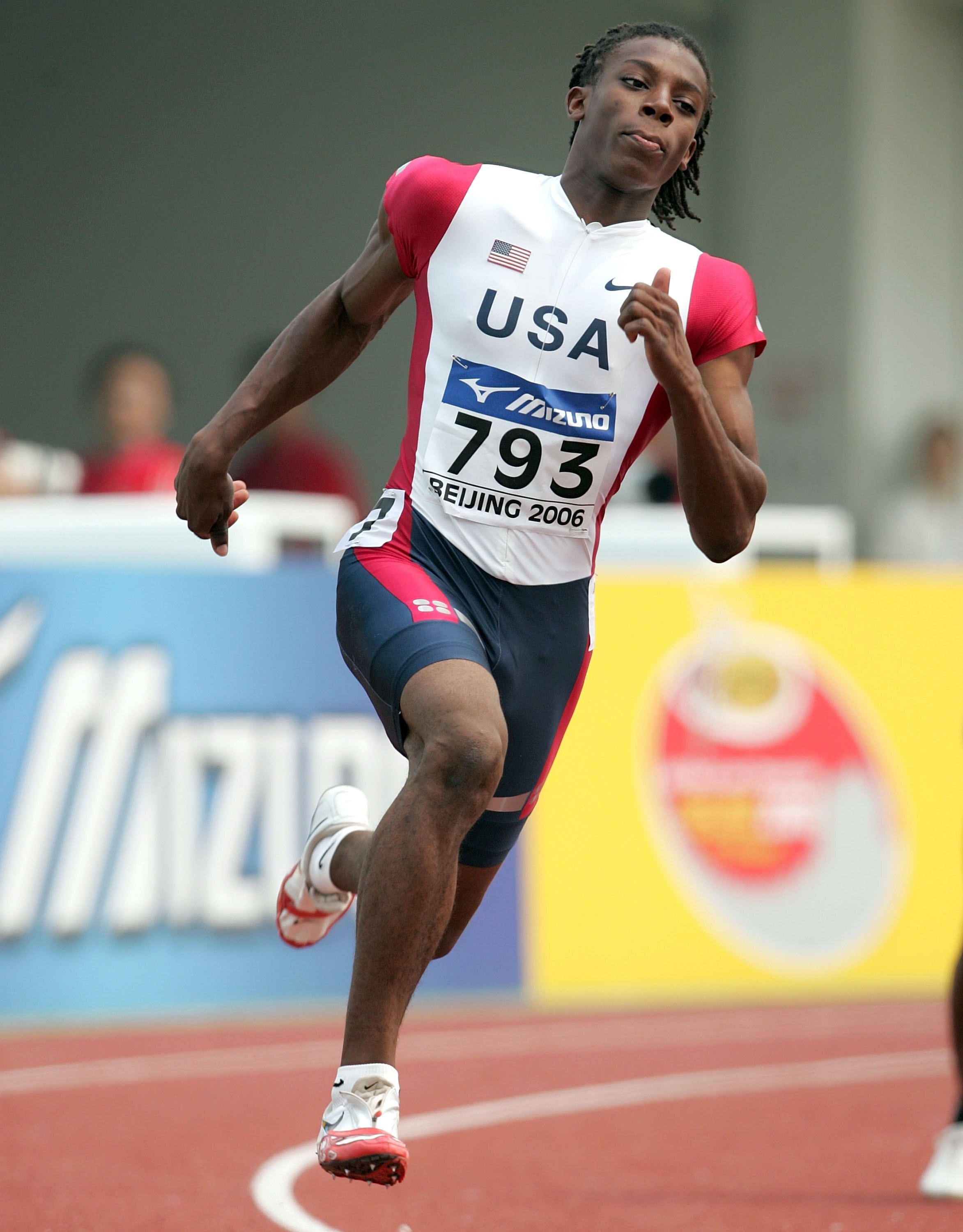 BEIJING - AUGUST 17:  Calvin Smith of the U.S. competes in the first round of the men's 200 meters on the third day of the 11th IAAF World Junior Championships August 16, 2006 in Beijing, China.  (Photo by Andy Lyons/Getty Images)