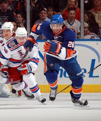 UNIONDALE, NY - MARCH 31: Matt Moulson #26 of the New York Islanders skates against the New York Rangers at the Nassau Coliseum on March 31, 2011 in Uniondale, New York.  (Photo by Bruce Bennett/Getty Images)
