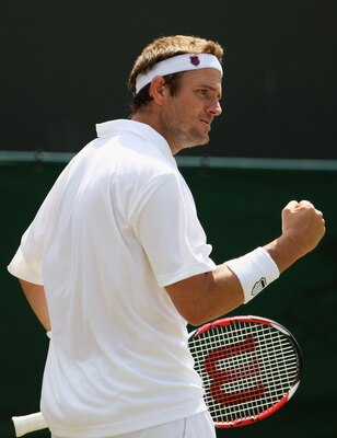 WIMBLEDON, ENGLAND - JUNE 24:  Mardy Fish of USA celebrates during the men's singles second round match against Janko Tipsarevic of Serbia on Day Three of the Wimbledon Lawn Tennis Championships at the All England Lawn Tennis and Croquet Club on June 24,